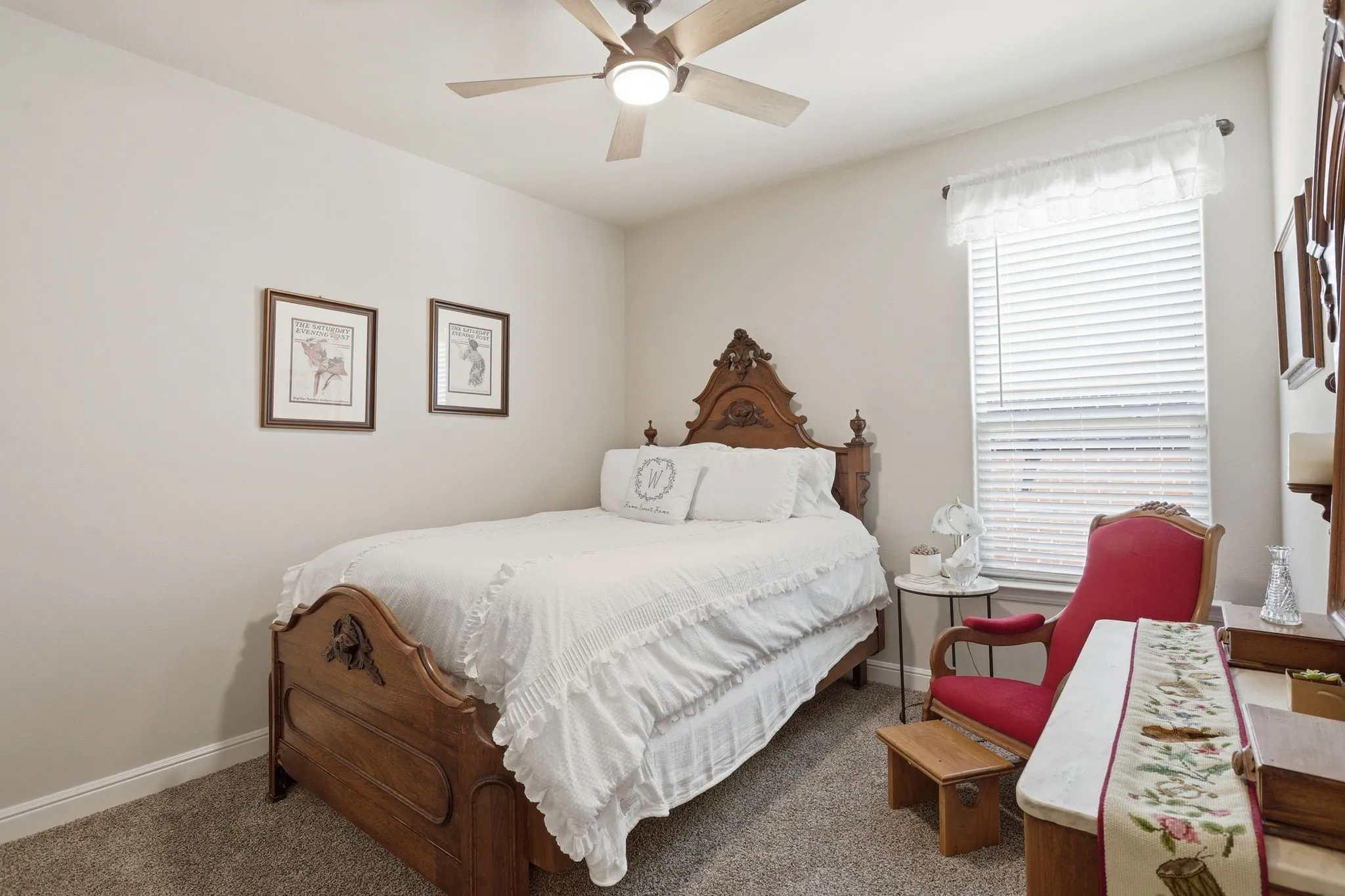 A ceiling fan is featured in each bedroom.