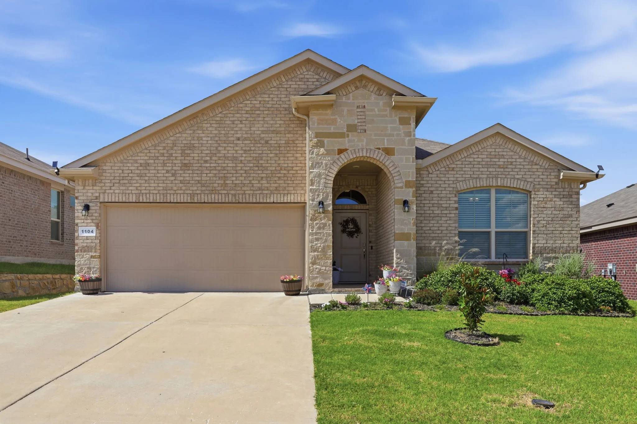 Great landscaping welcomes you.