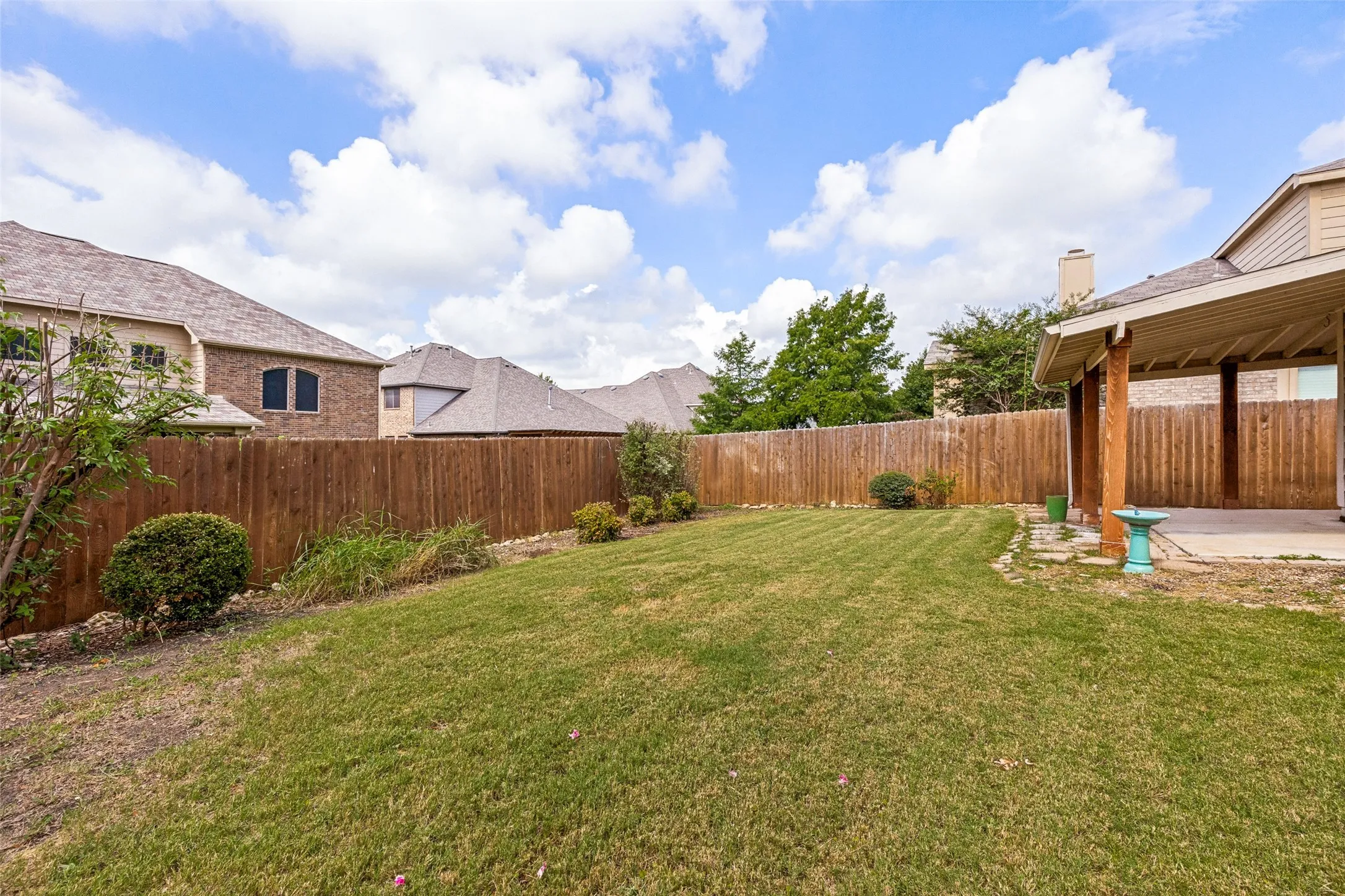 Large yard with grass