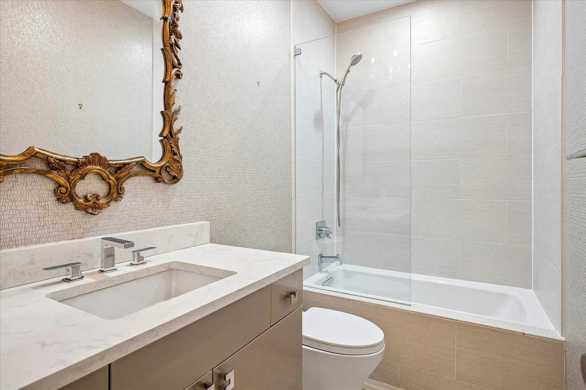 Guest bathroom remodeled including acrylic cabinets.