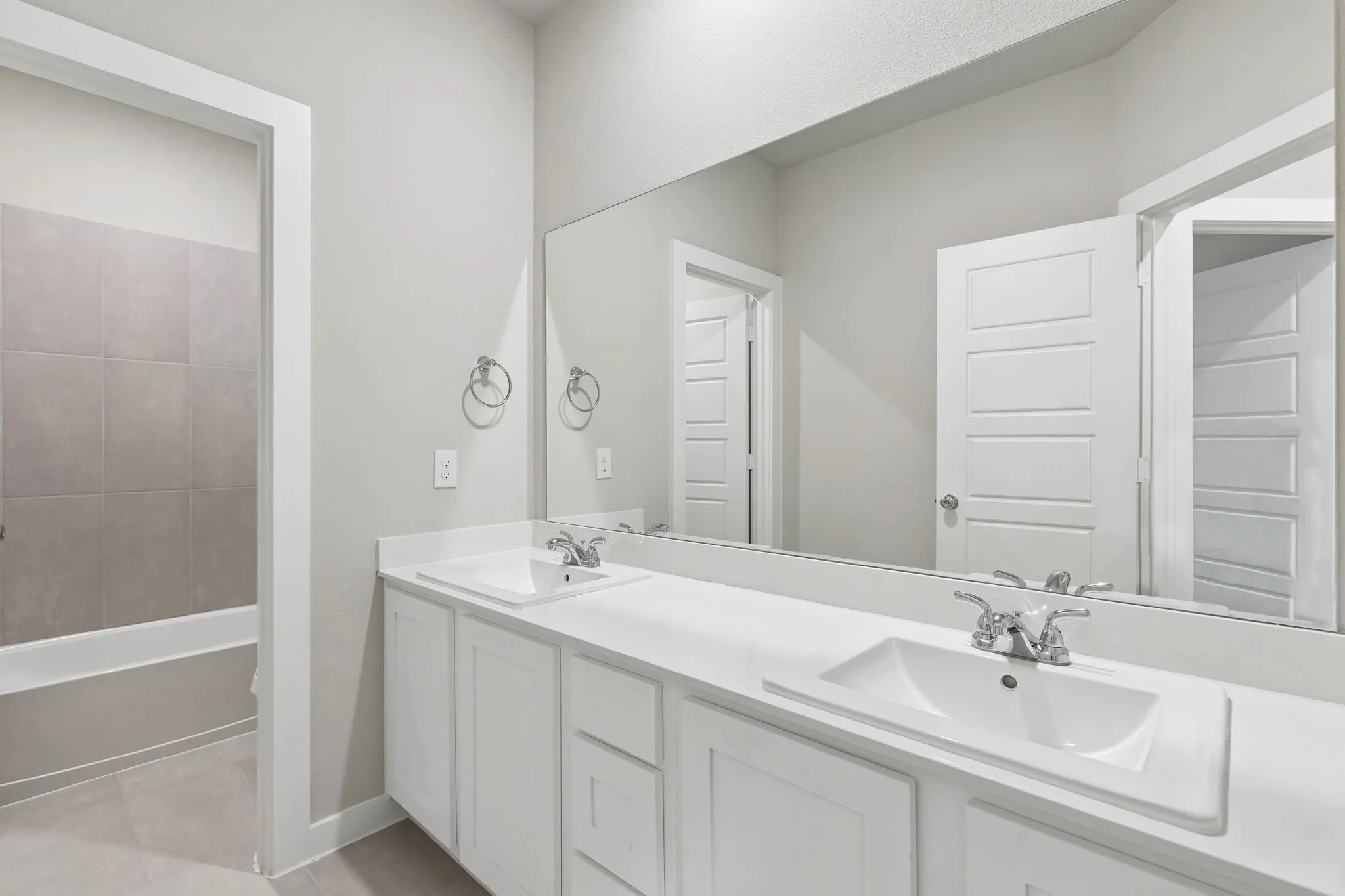 Bathroom in the Winters home plan by Trophy Signature Homes – REPRESENTATIVE PHOTO