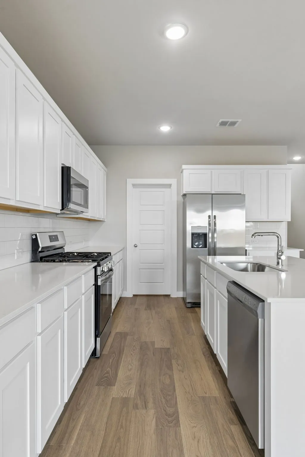 Kitchen in the Winters home plan by Trophy Signature Homes – REPRESENTATIVE PHOTO