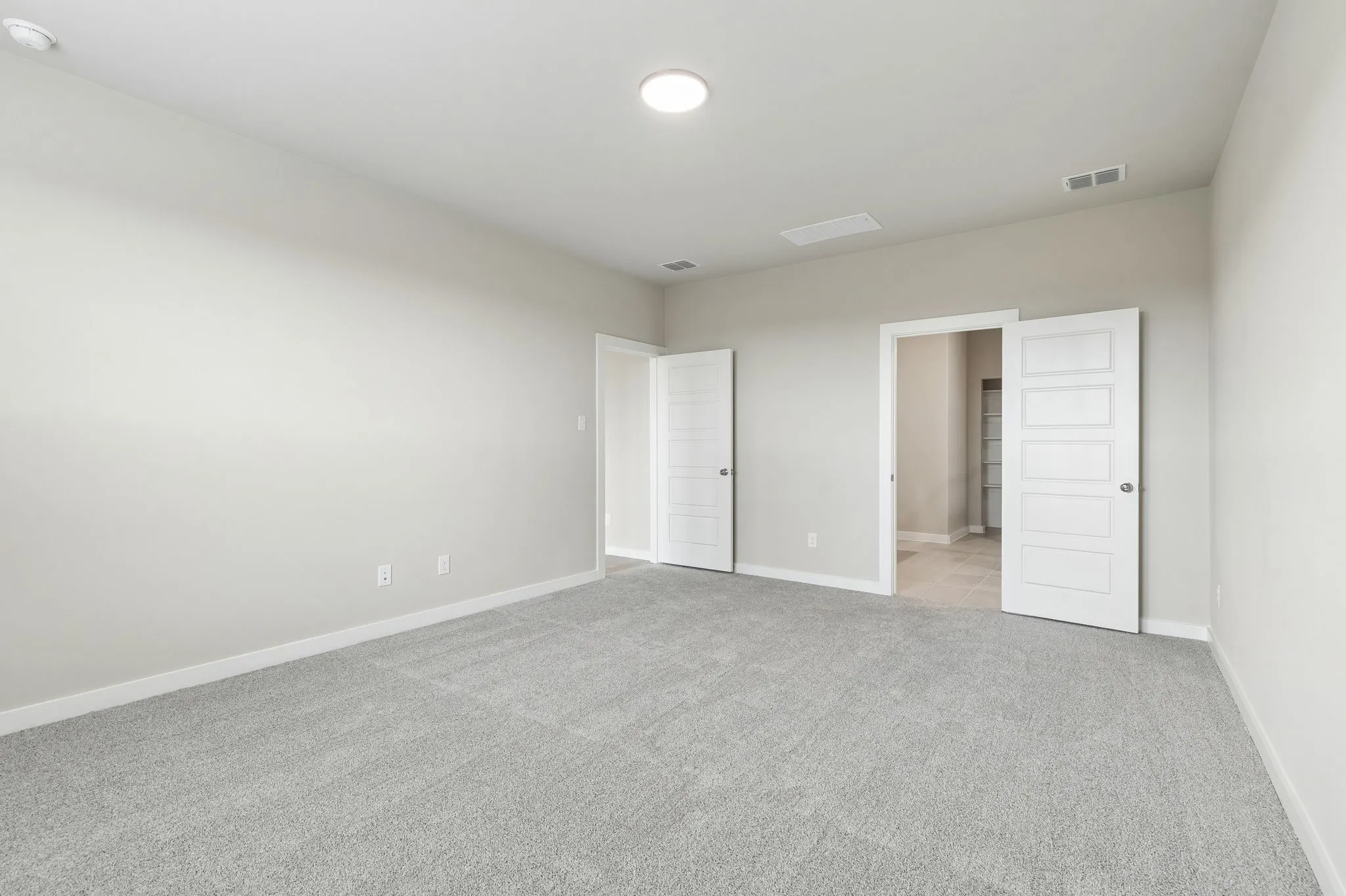 Primary Suite in the Winters home plan by Trophy Signature Homes – REPRESENTATIVE PHOTO