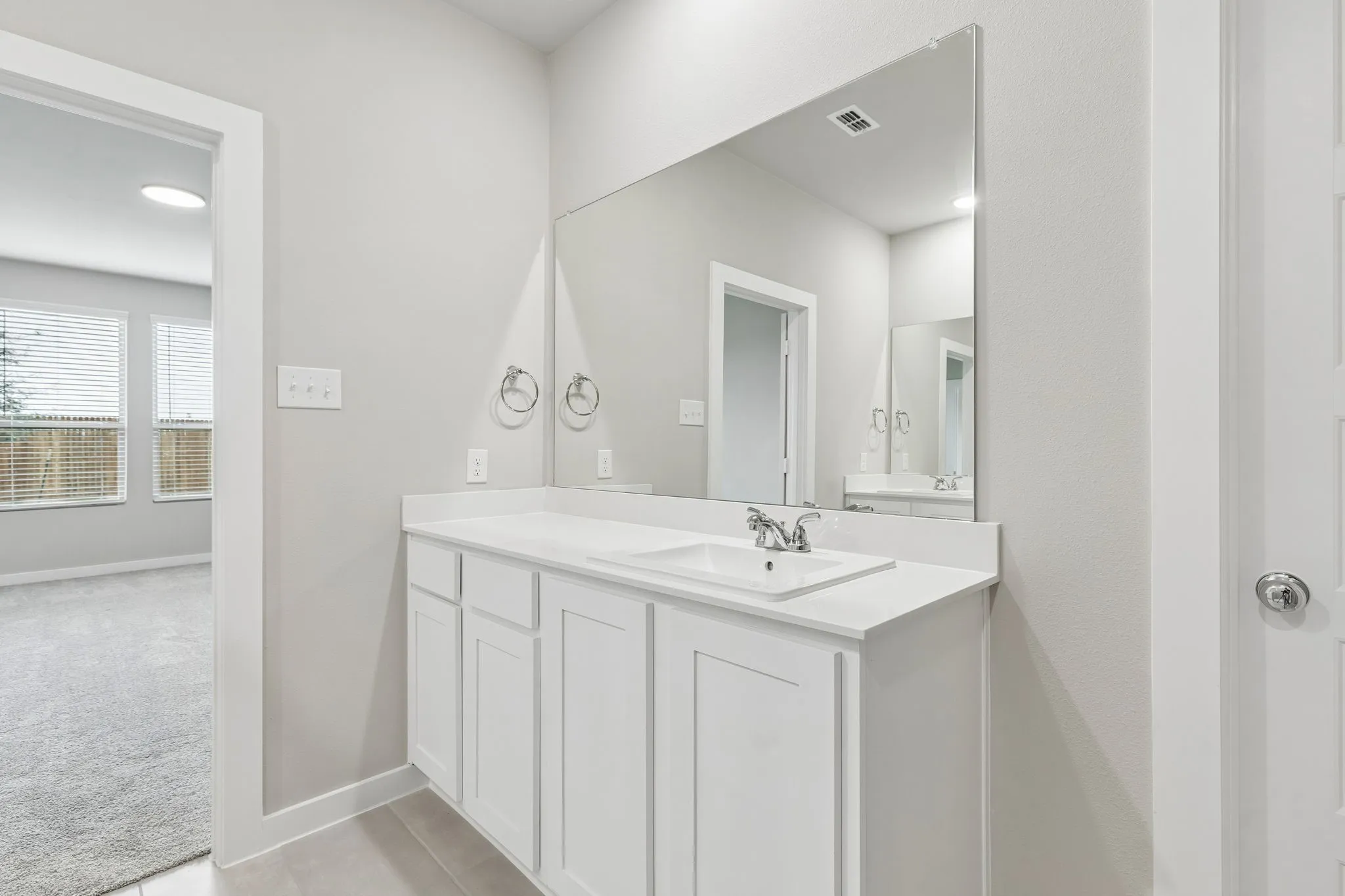 Primary Bathroom in the Winters home plan by Trophy Signature Homes – REPRESENTATIVE PHOTO