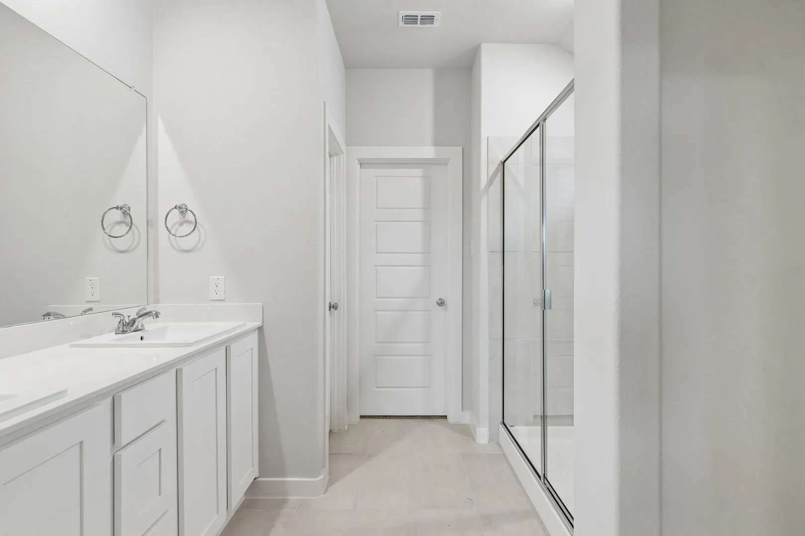 Primary Bathroom in the Oscar home plan by Trophy Signature Homes – REPRESENTATIVE PHOTO