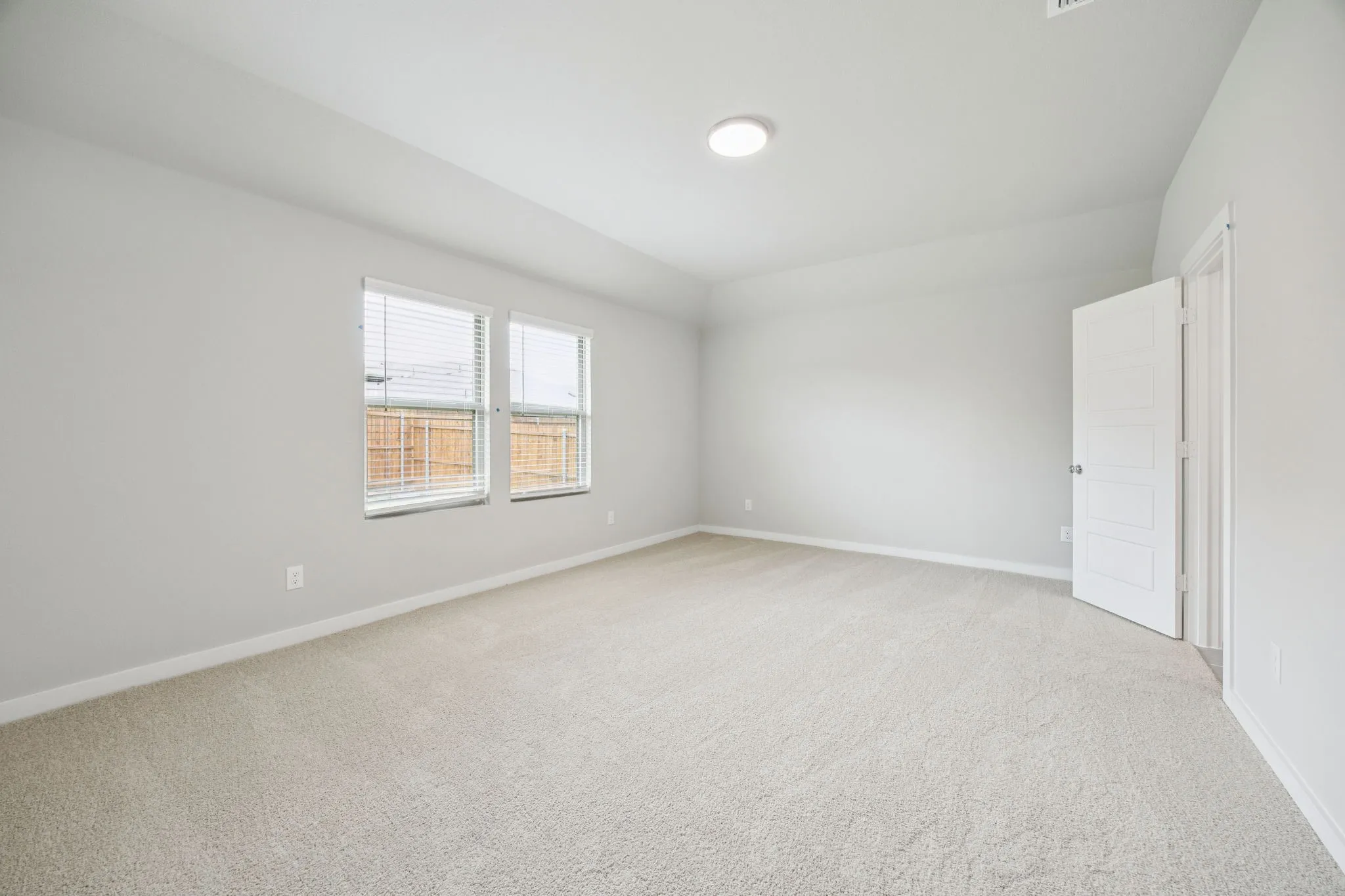 Primary Suite in the Hayden home plan by Trophy Signature Homes – REPRESENTATIVE PHOTO