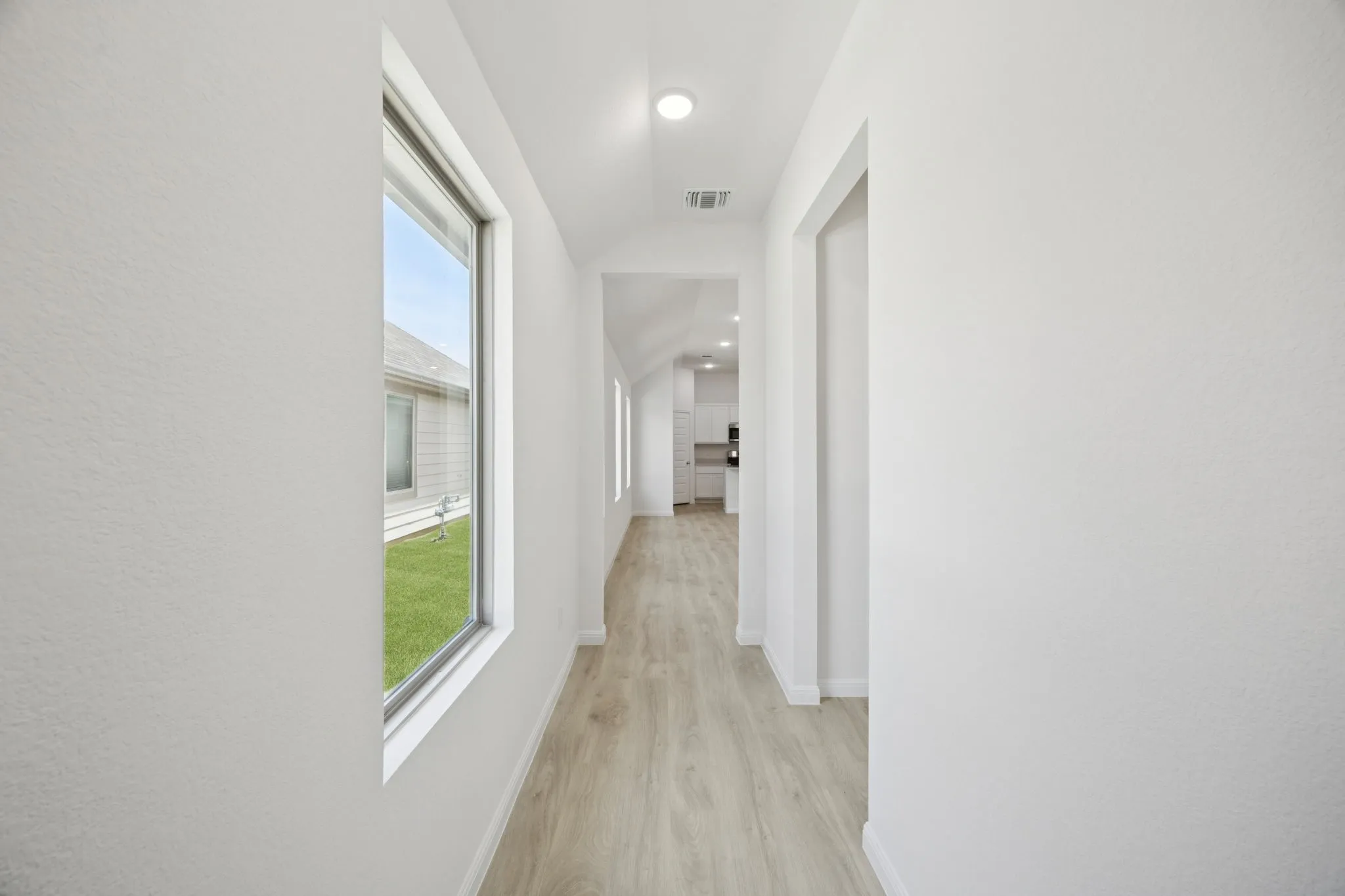 Entryway in the Cypress home plan by Trophy Signature Homes - REPRESENTATIVE PHOTO