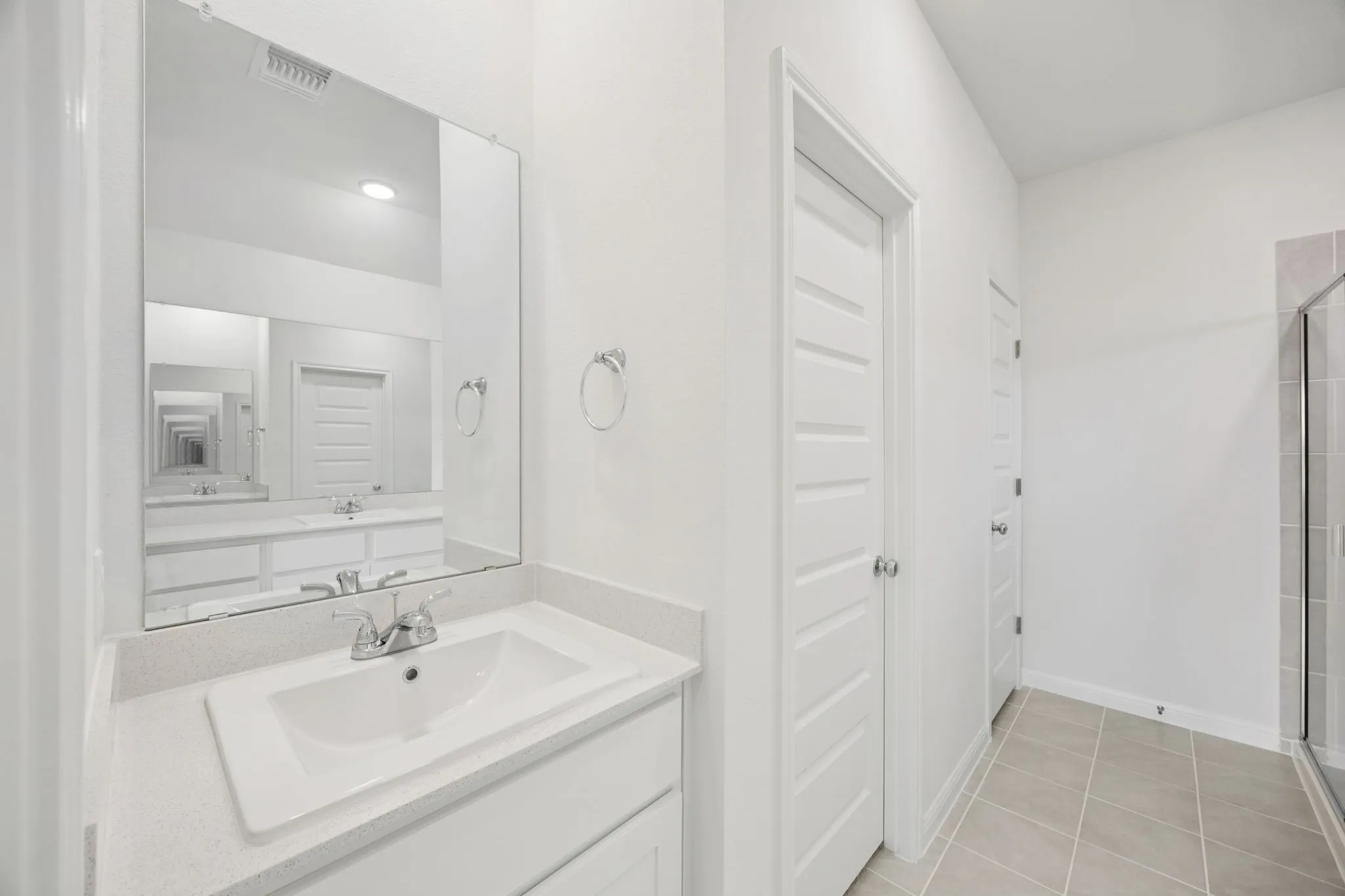 Primary Bathroom in the Cypress home plan by Trophy Signature Homes - REPRESENTATIVE PHOTO