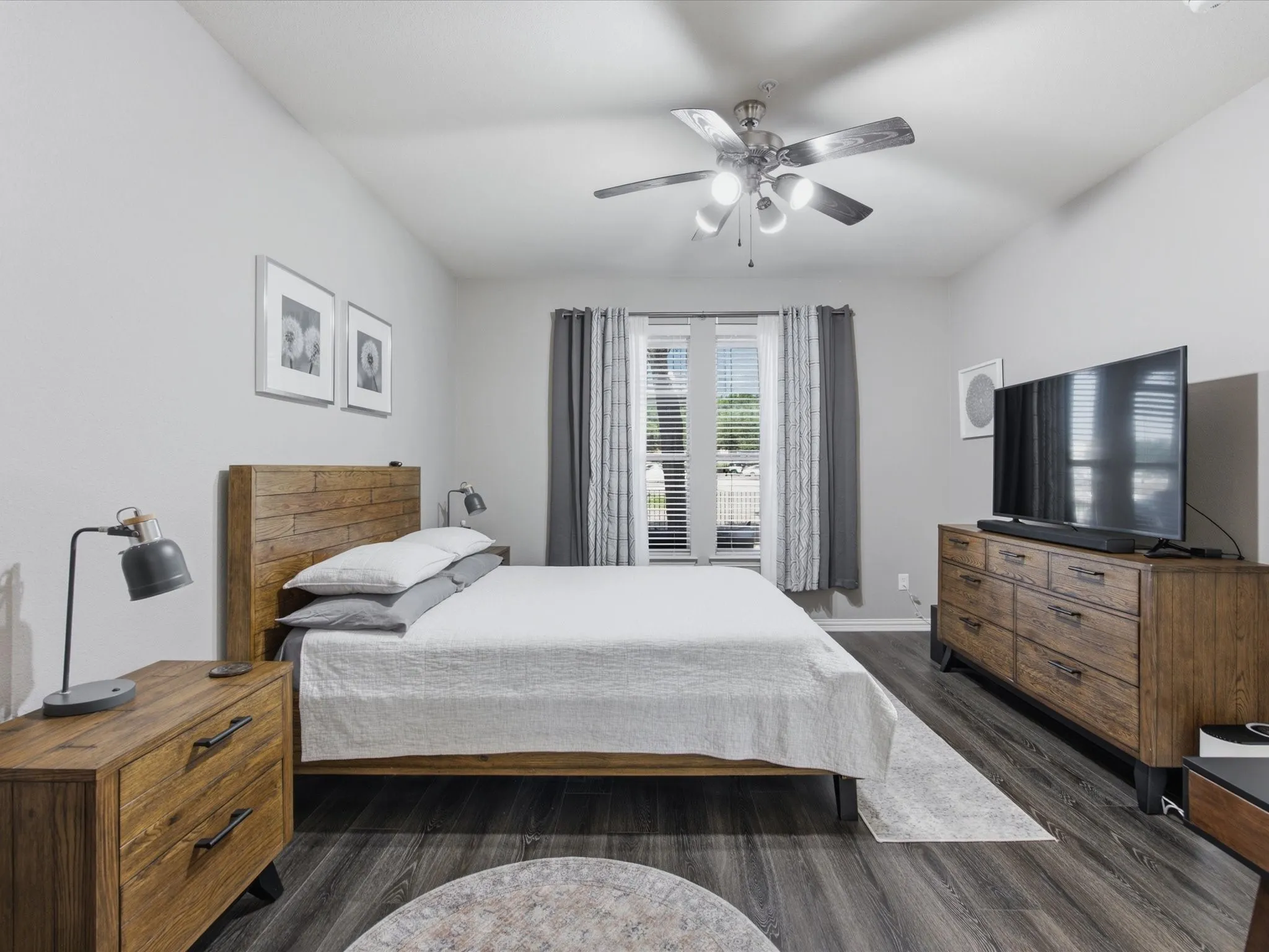 Primary Bedroom featuring wood-finish flooring and light gray wall tones