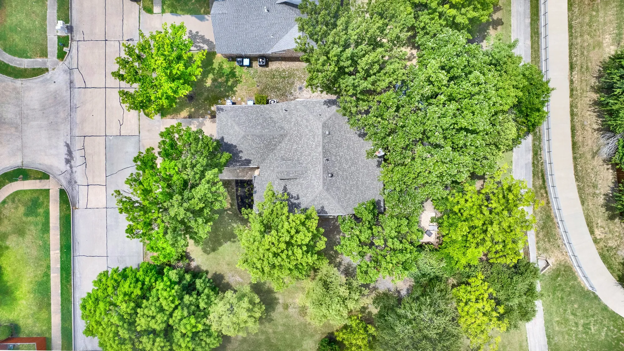 With all the trees the home is fairly shaded from the Texas sun