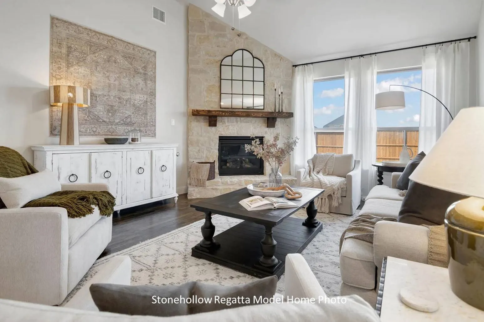 Stone Fireplace, real wood flooring, lots of windows
