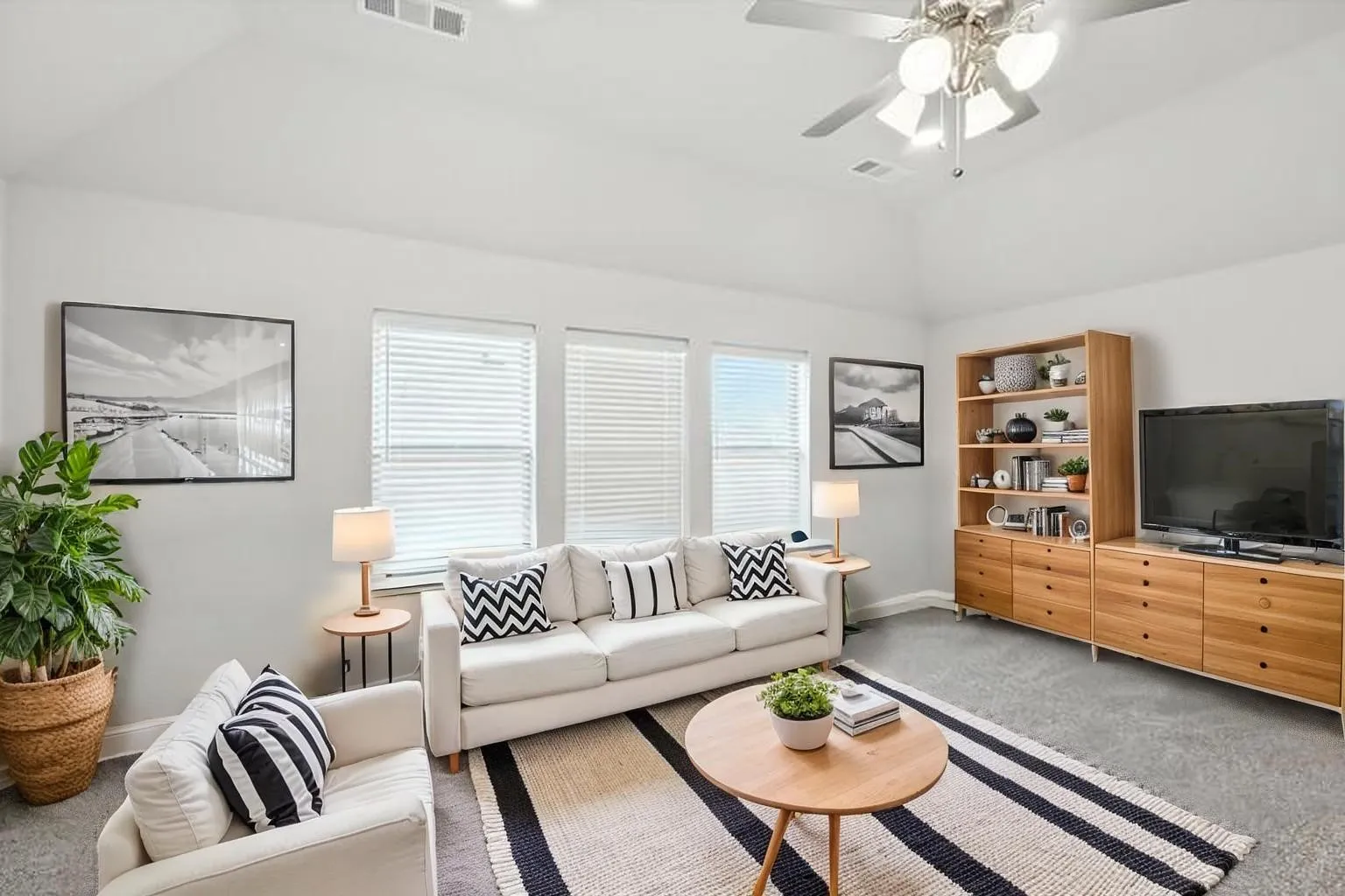 Family Room at the top of the stairs and adjacent to the Media room  **virtually staged**