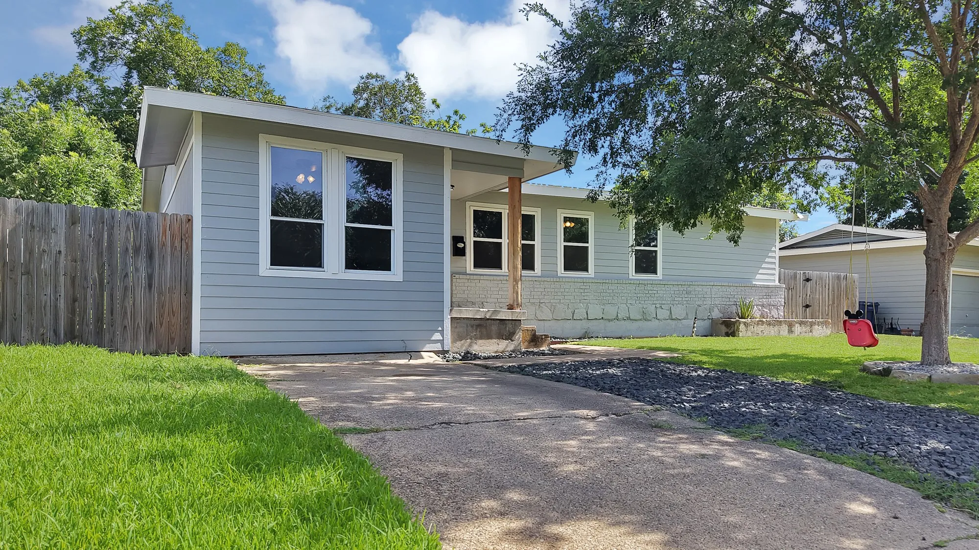 Light blue siding exterior with white trim