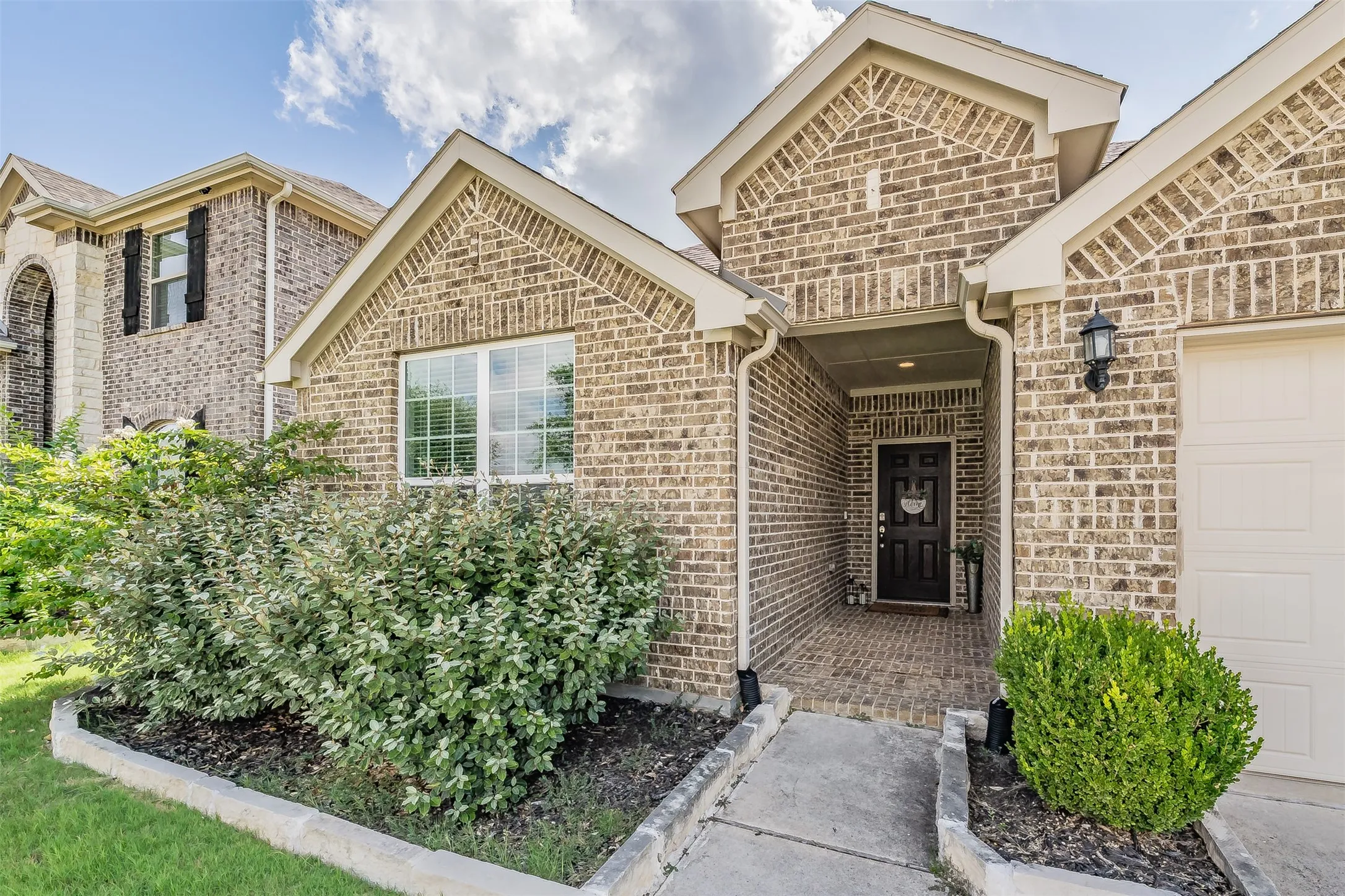 Inviting brick covered entry, welcome home