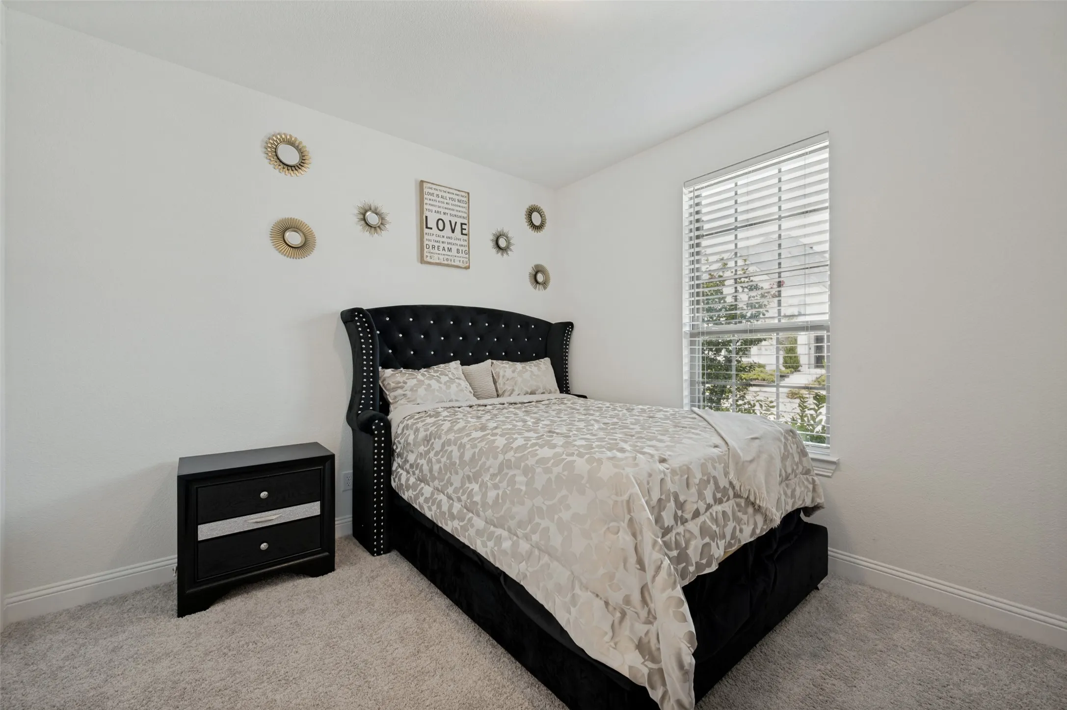 Separated guest bedroom on the first floor, with a dedicated full bath