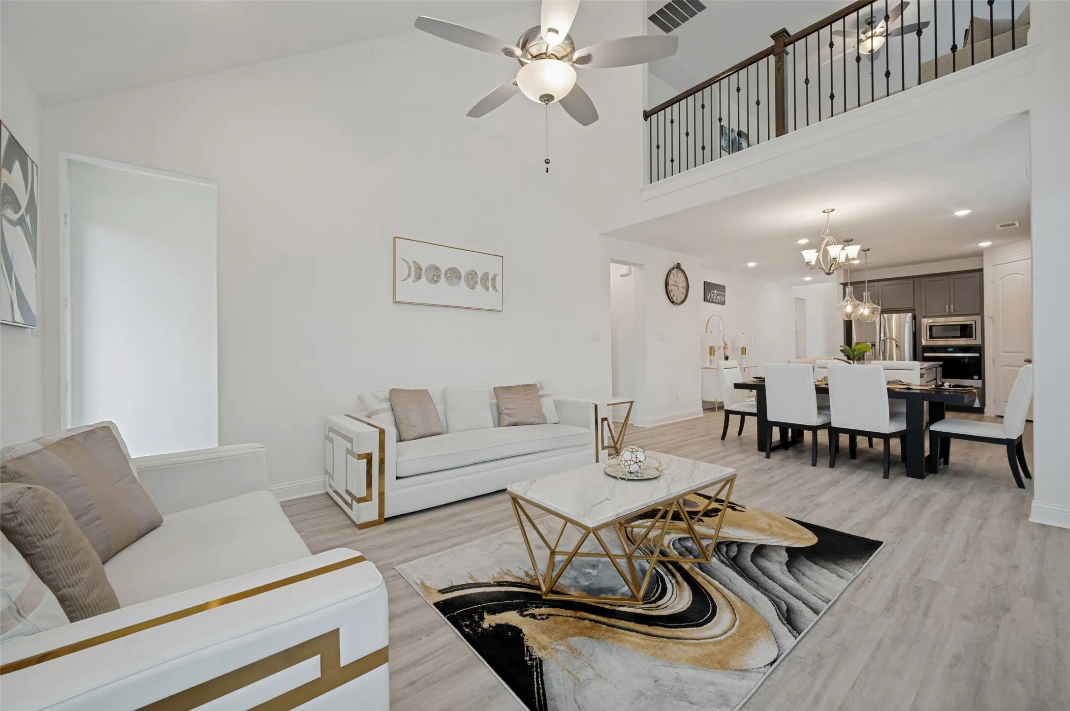 Light colored floors make the space feel even brighter
