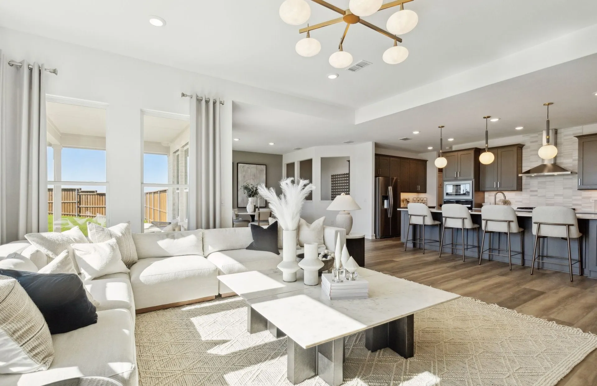 *Model Representation - Gathering room with view of main living areas