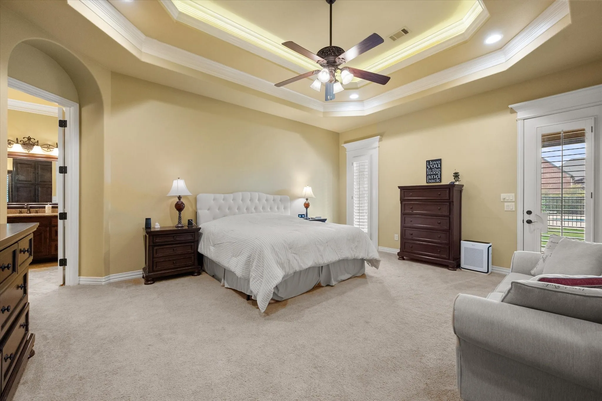 Tray ceiling with crown molding and recessed lighting
