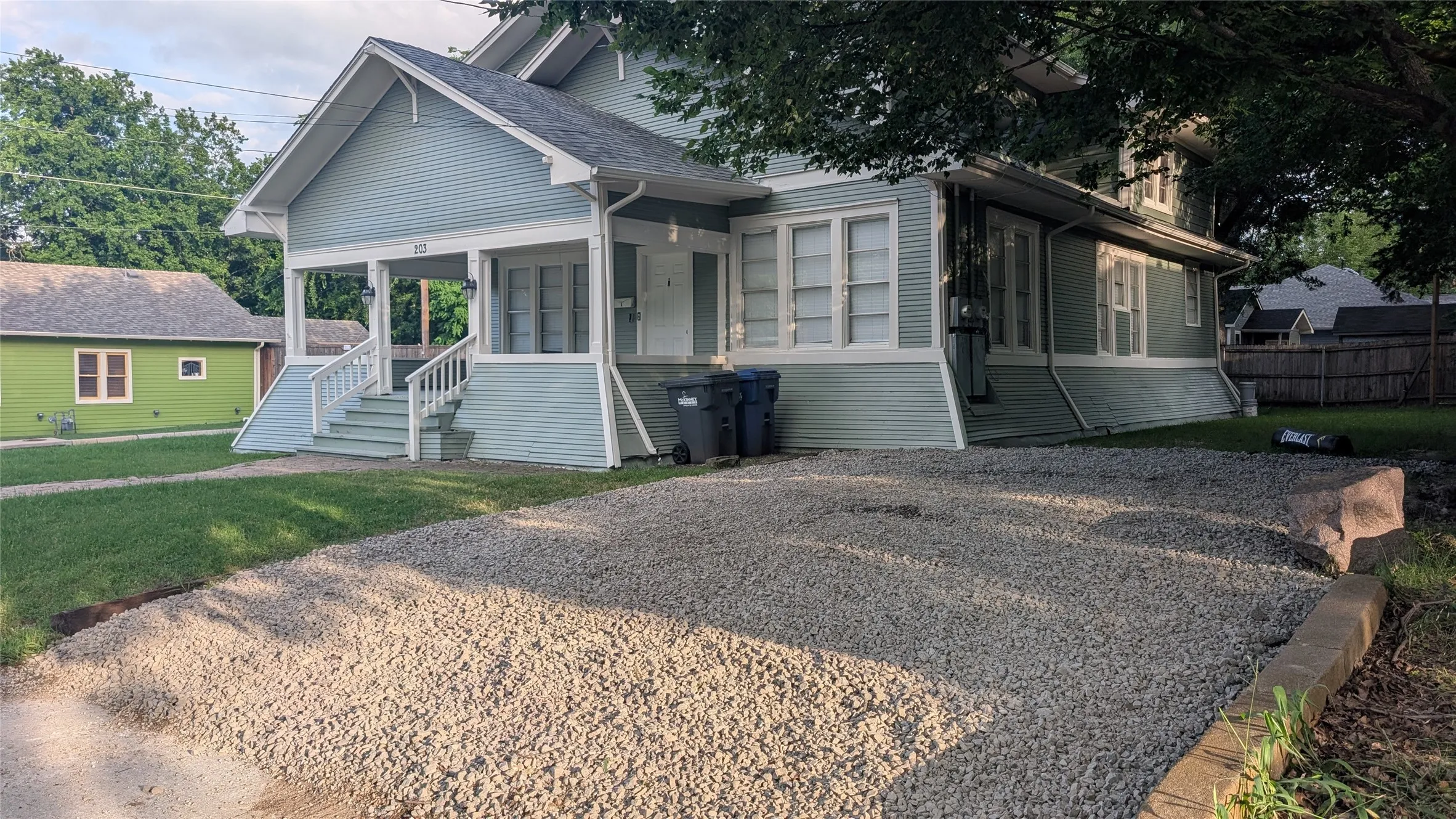 Light blue siding with white trim