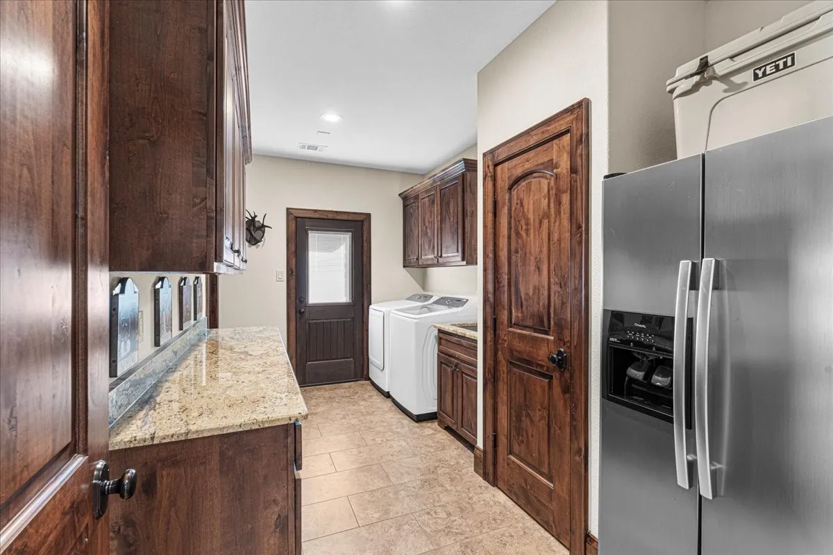 Large laundry with 2 large storage closets