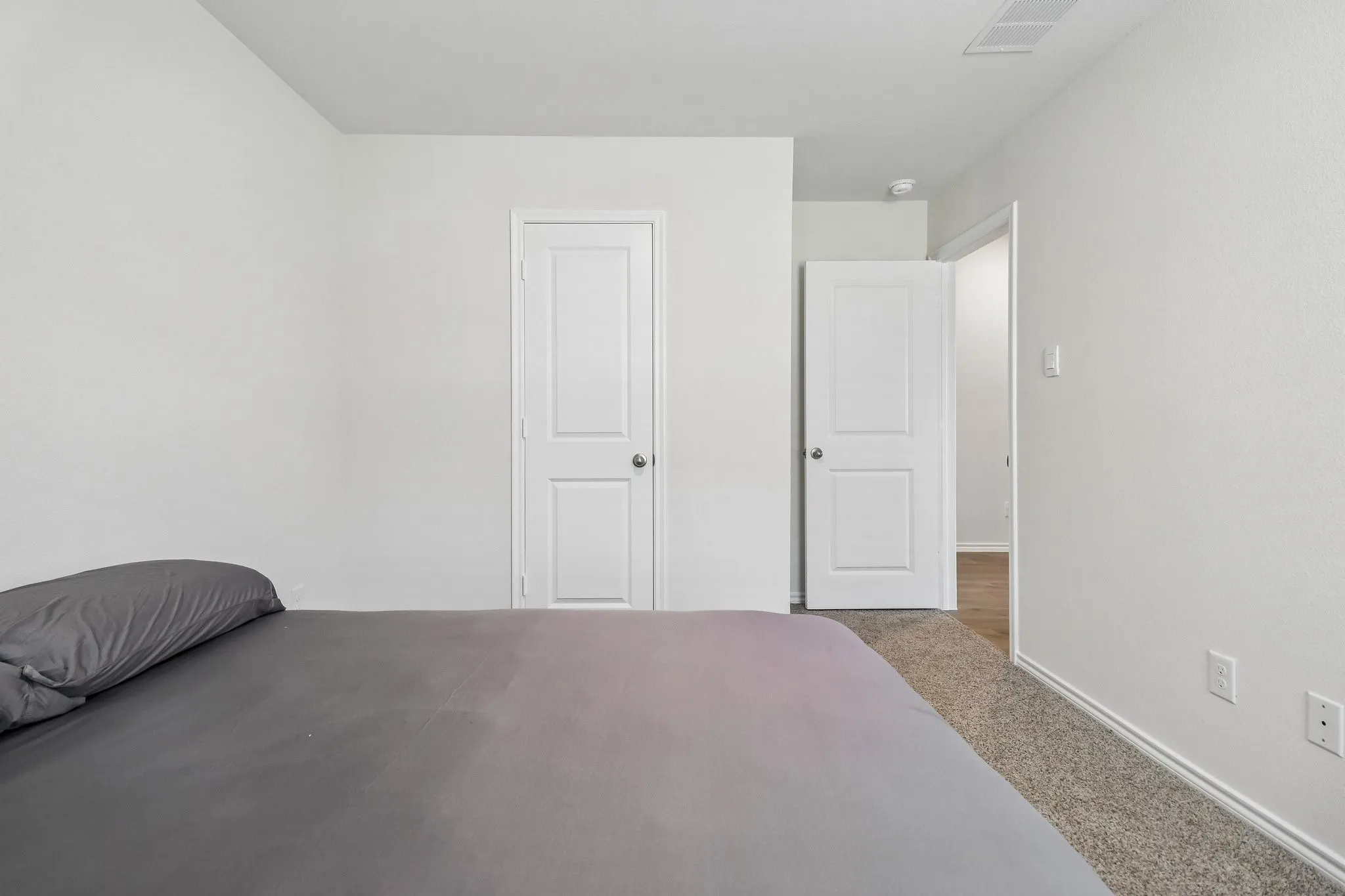 Neutral paint palette with textured walls and crisp white trim
