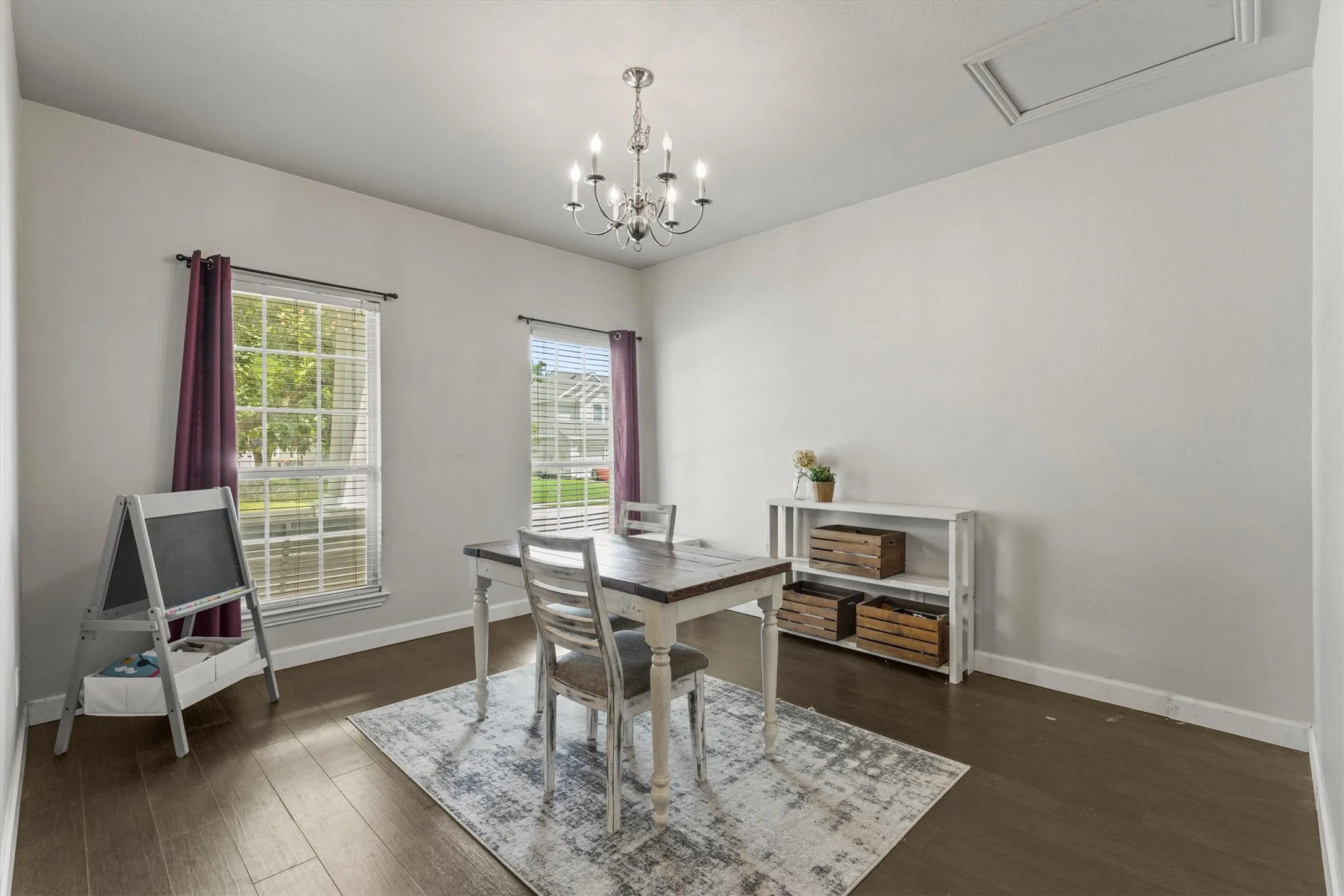Large formal dining area at entry that could also be used as a formal living space or office