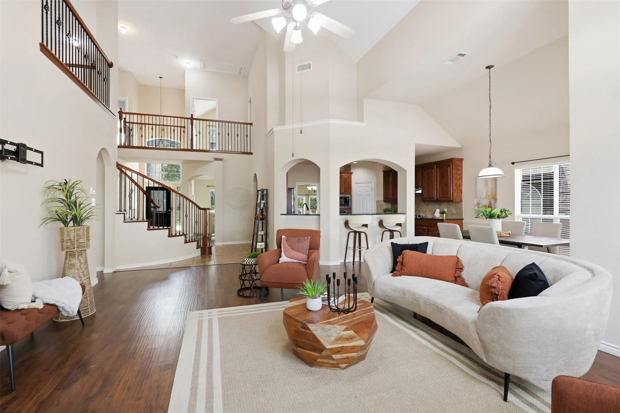 Open Concept Space with Grand Staircase and Balcony bring an elegant feel to the home.
