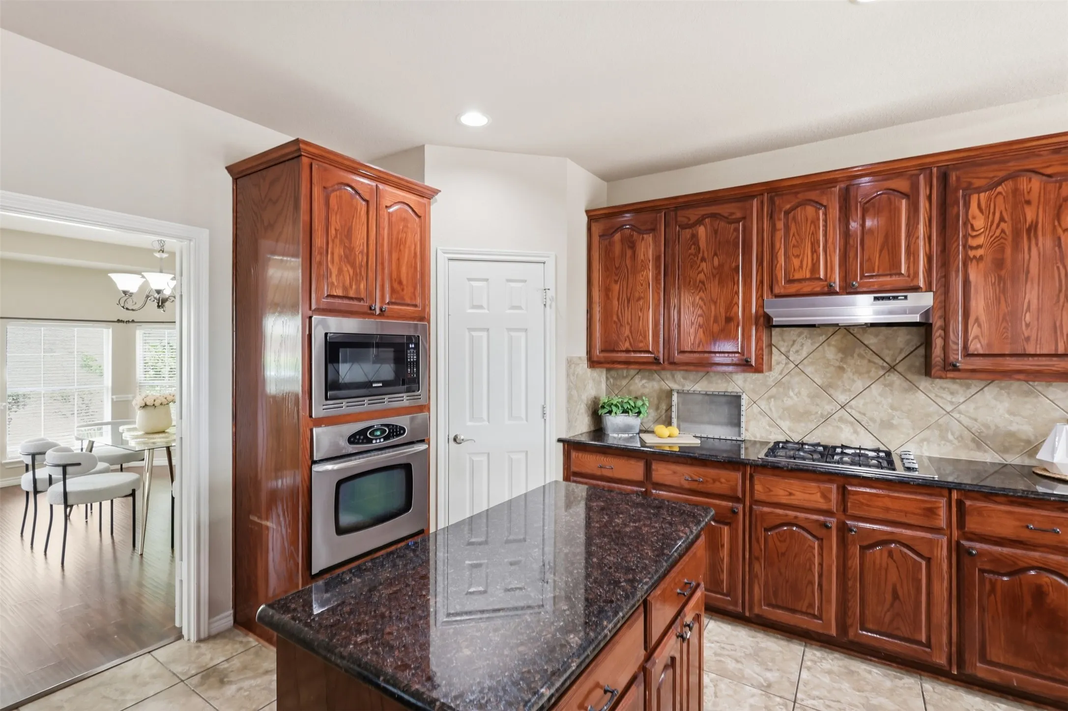 Dining Area opens to Kitchen for easy meal service.