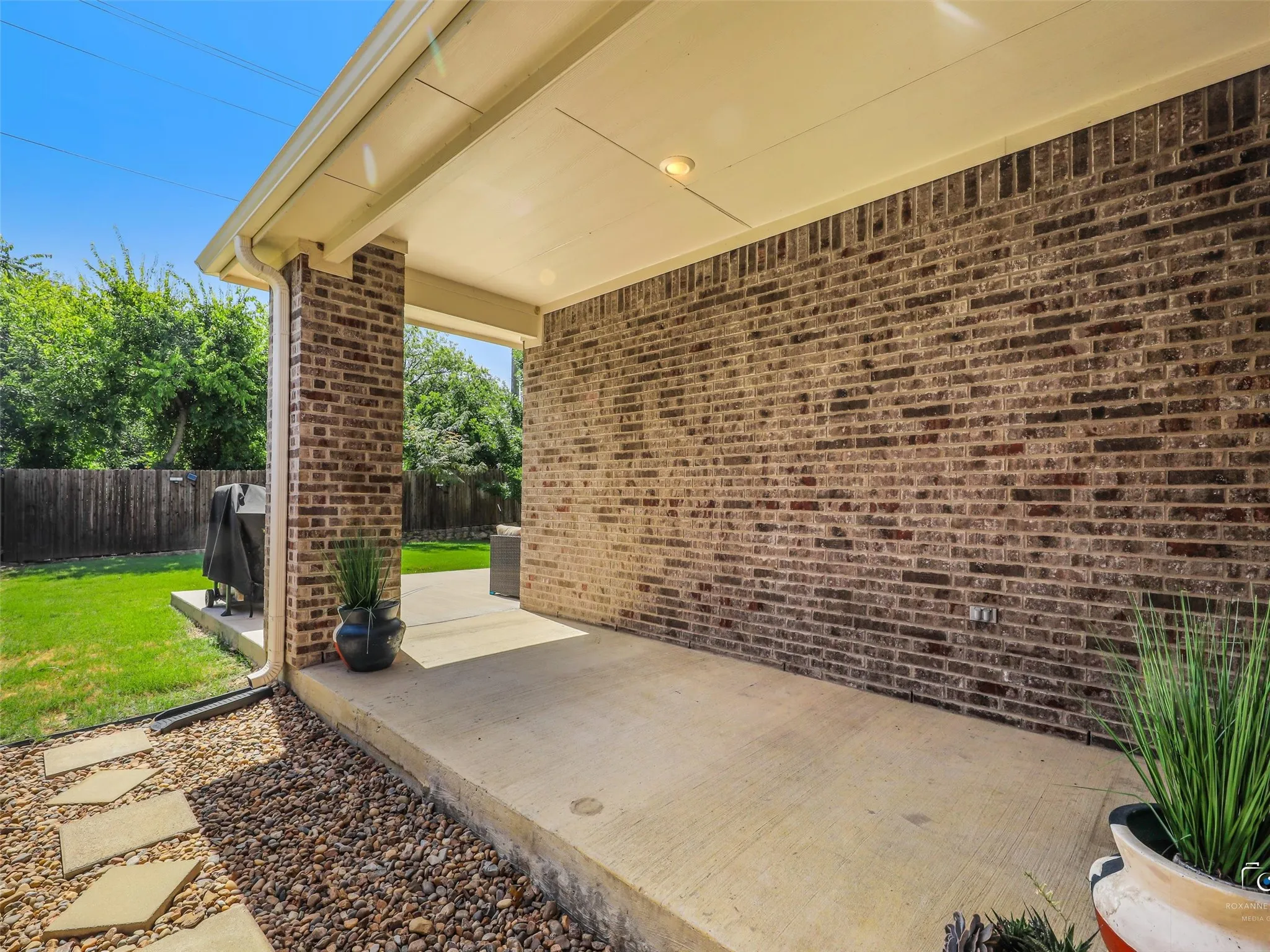 Walk out from the Breakfast nook to the covered portion of the patio
