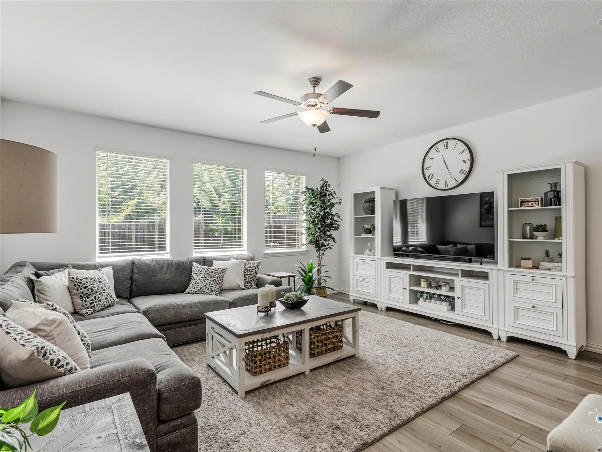 The Living Room looks out over the serene and private backyard