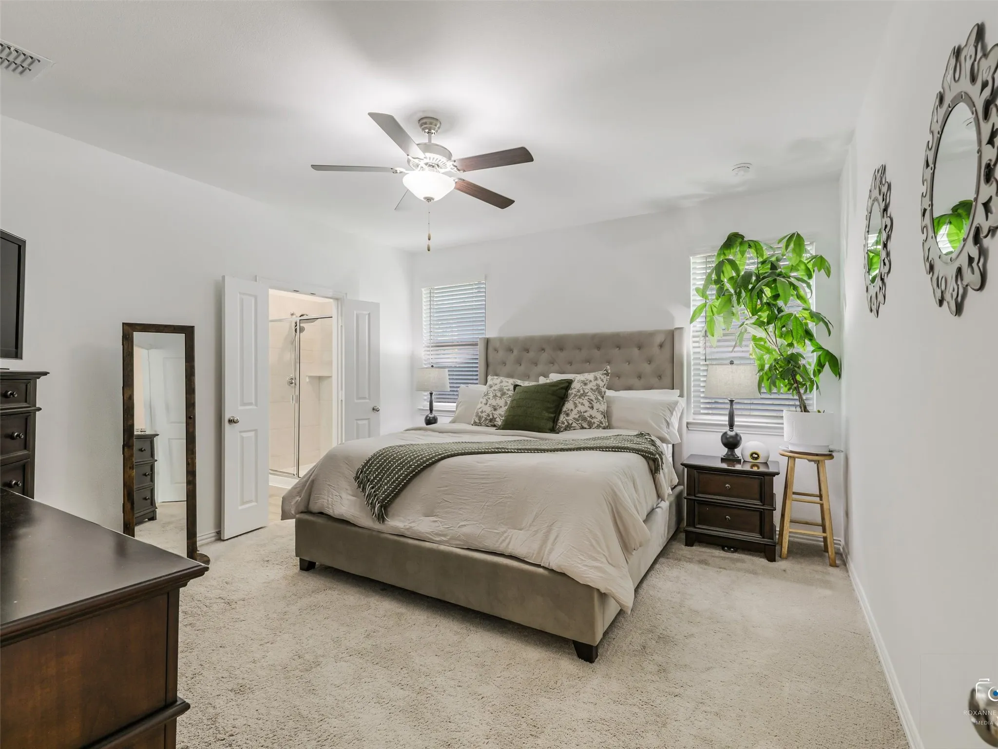The primary suite includes a luxurious shower only bathroom and a large walk-in closet