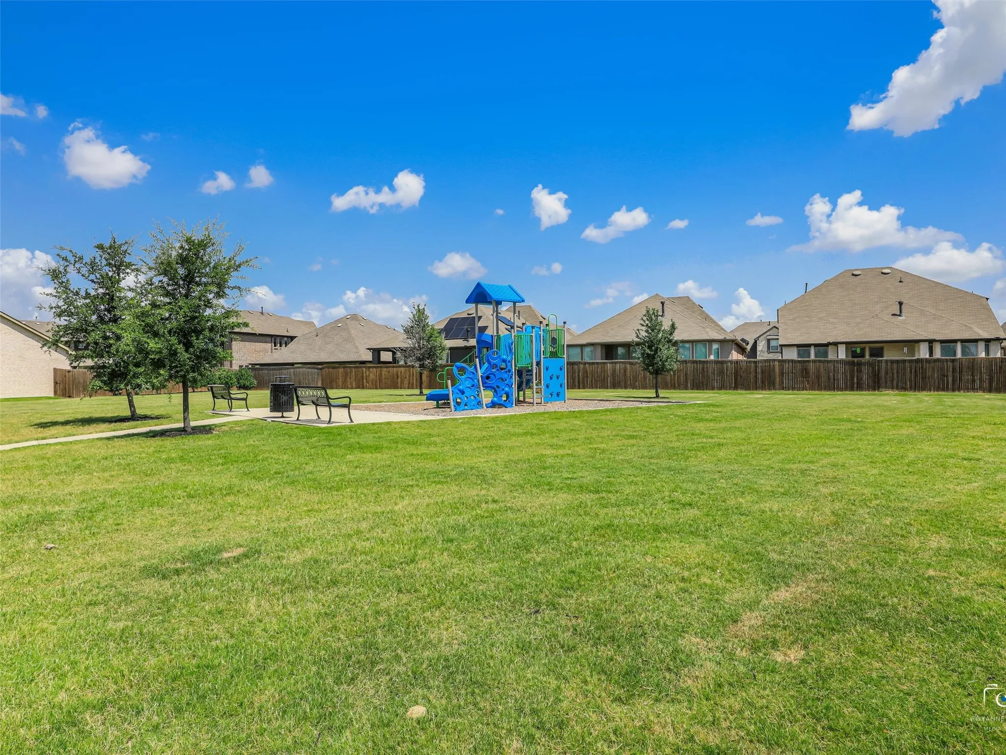 Playground is located next to the community pool