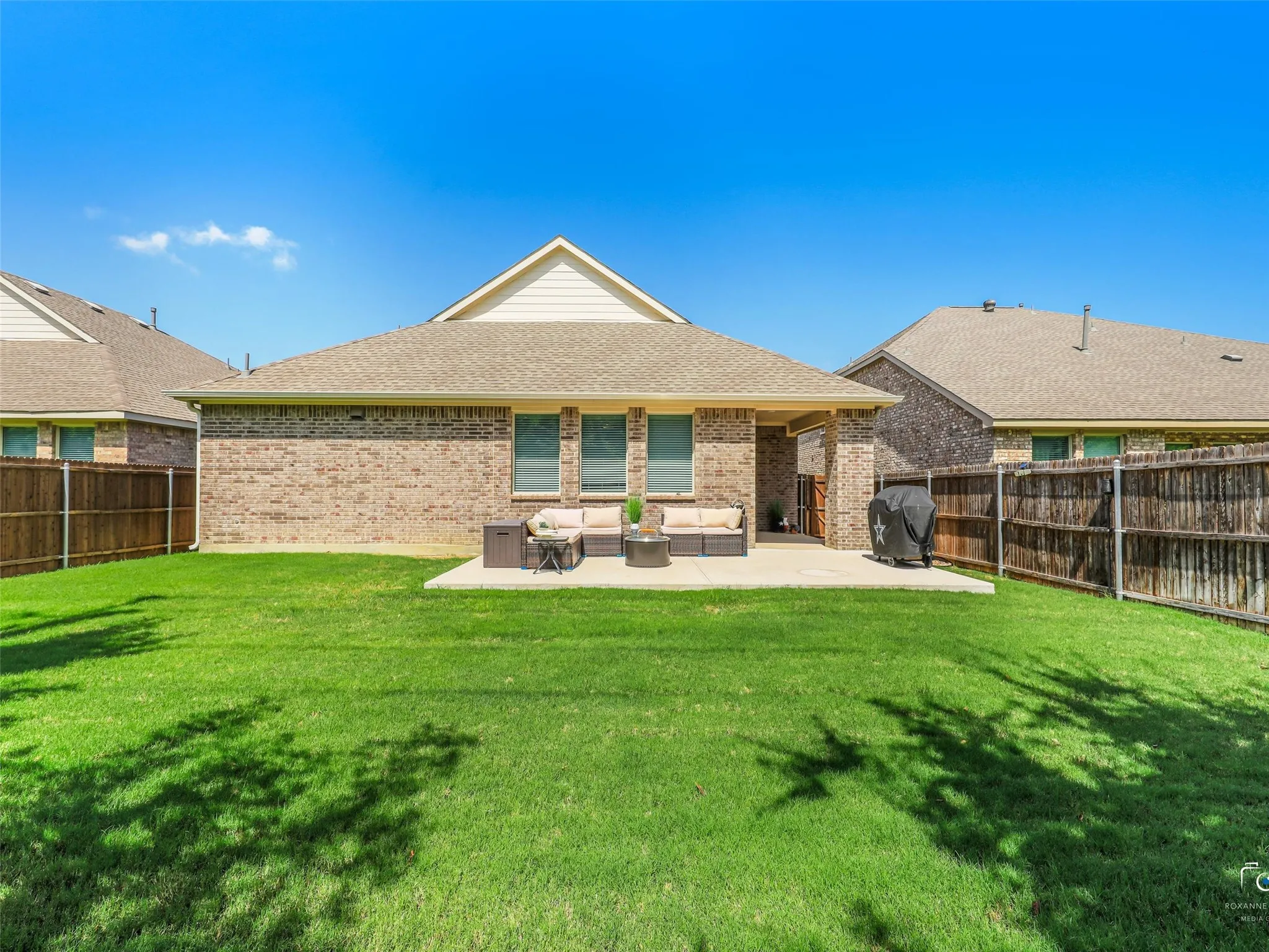 15 SEER rated HVAC system, 1 unit. Wood privacy fence with steel posts. Gutters were added after purchase