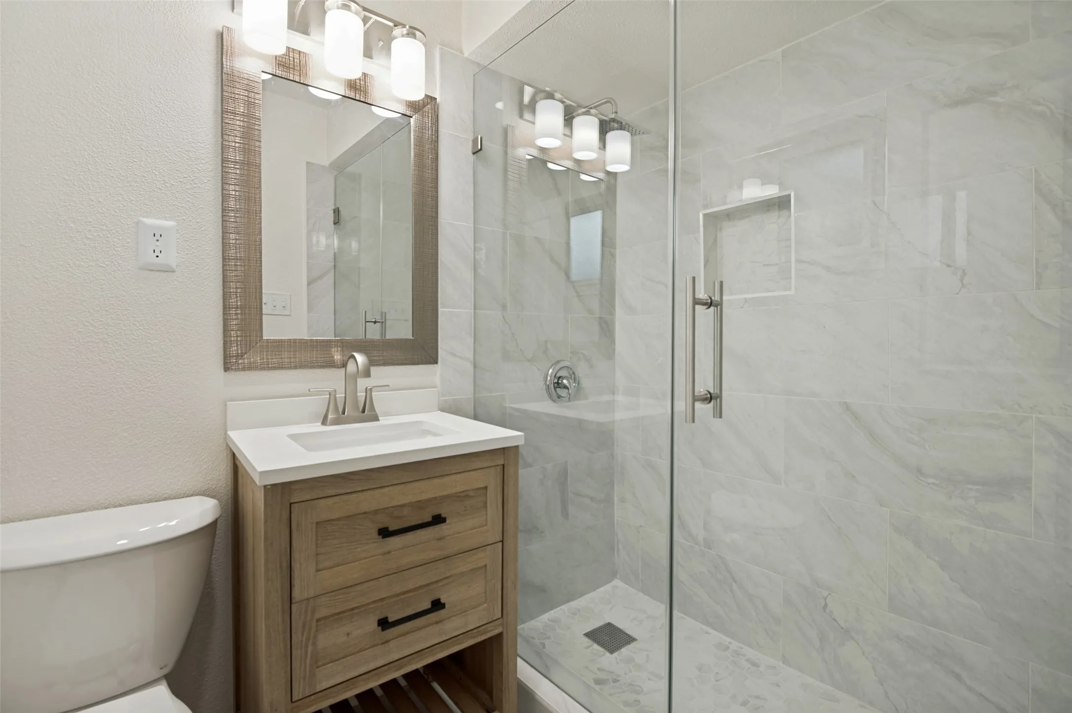 Primary bathroom with glass shower