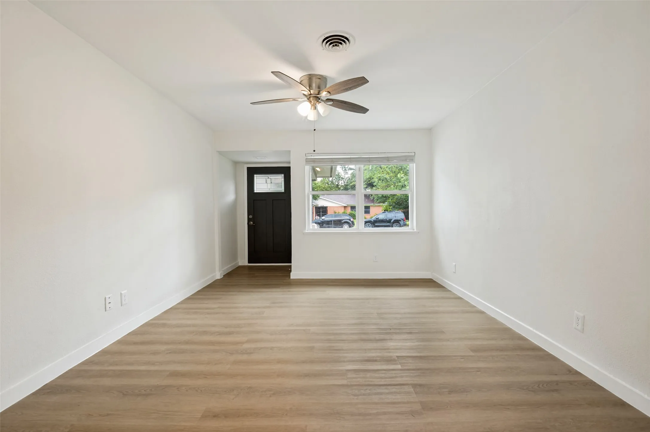 Front living room looking toward front door.