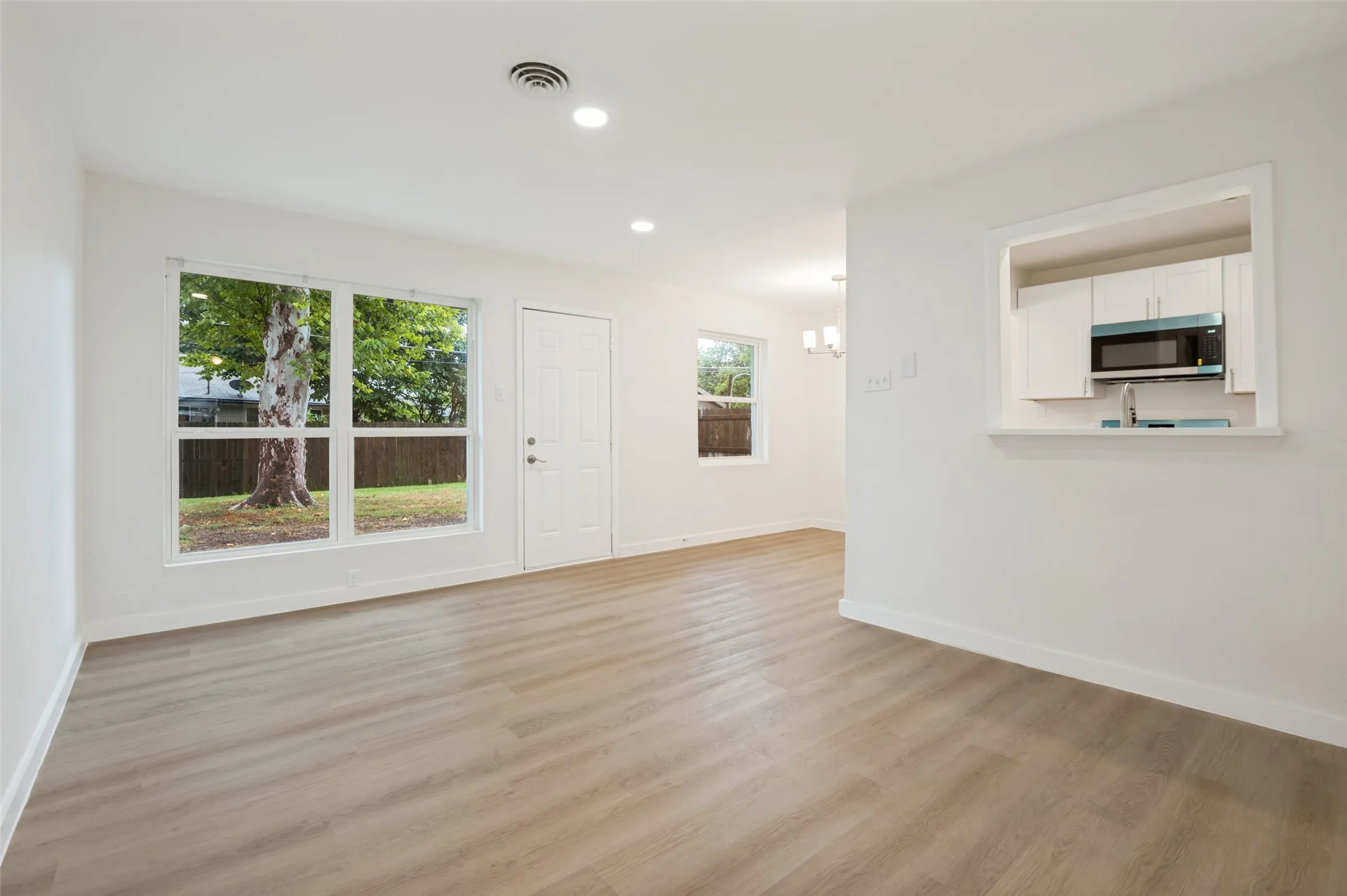 Dining room with backyard view