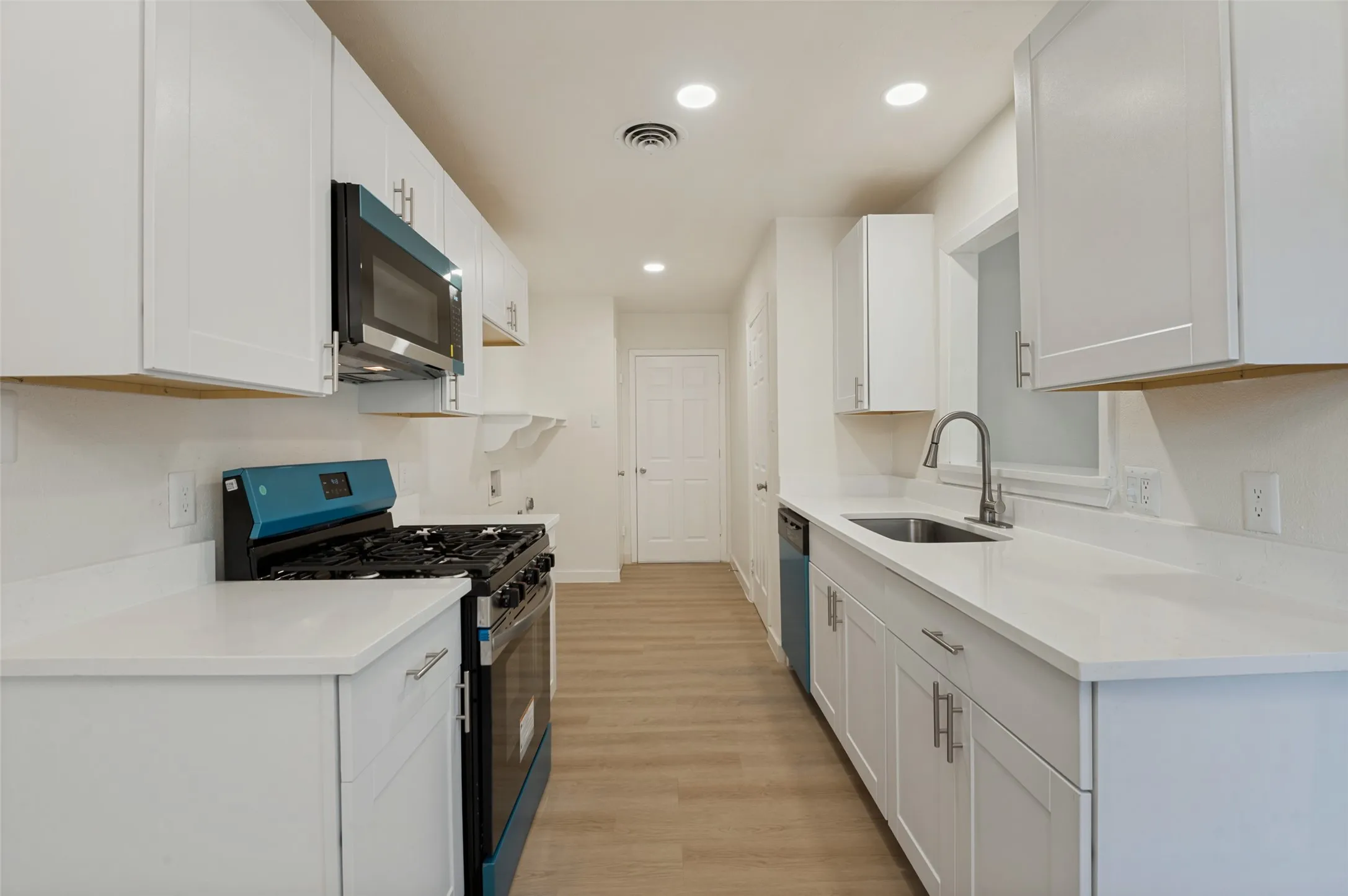 New cabinets and quartz counters