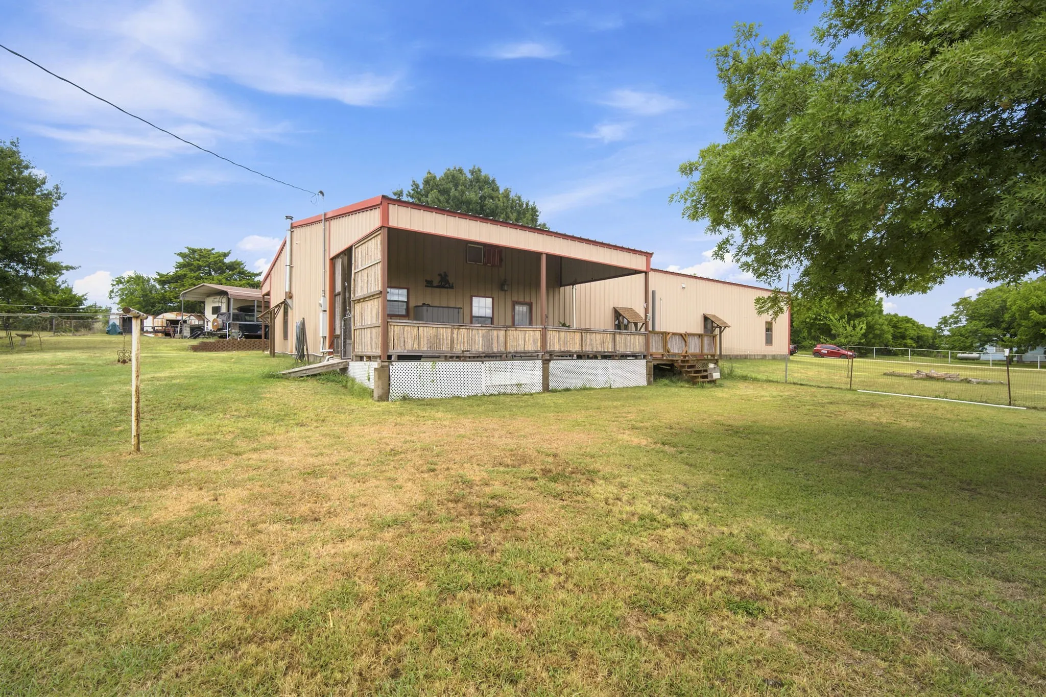 Plenty of room for playground or even a pool on this one acre lot!