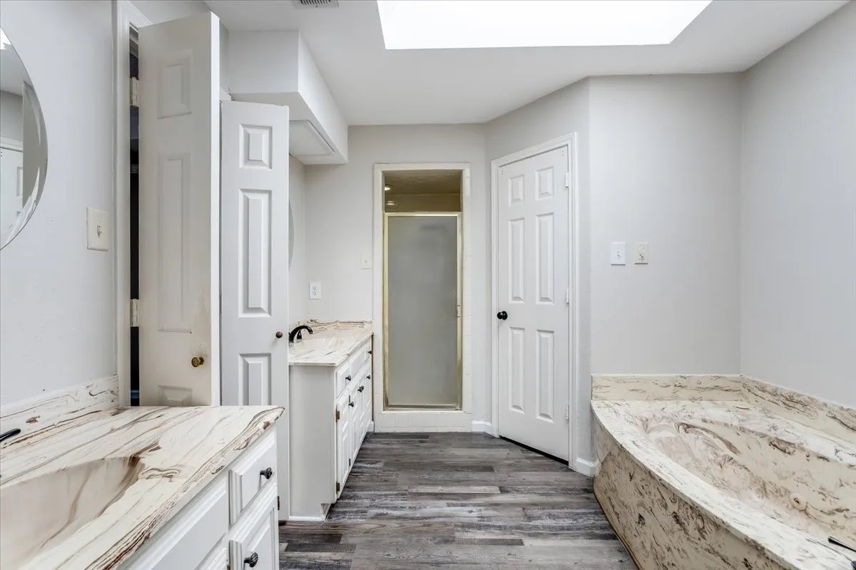 garden tub under skylight