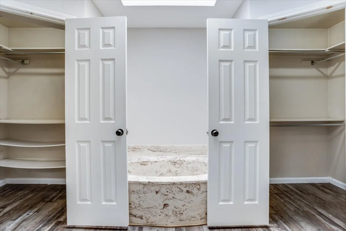 double door to primary bathroom.