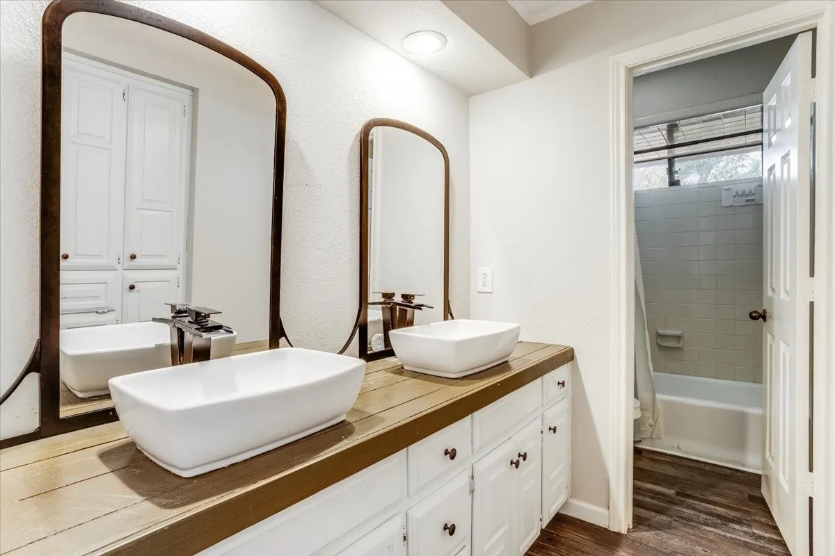 secondary bathroom with double sinks