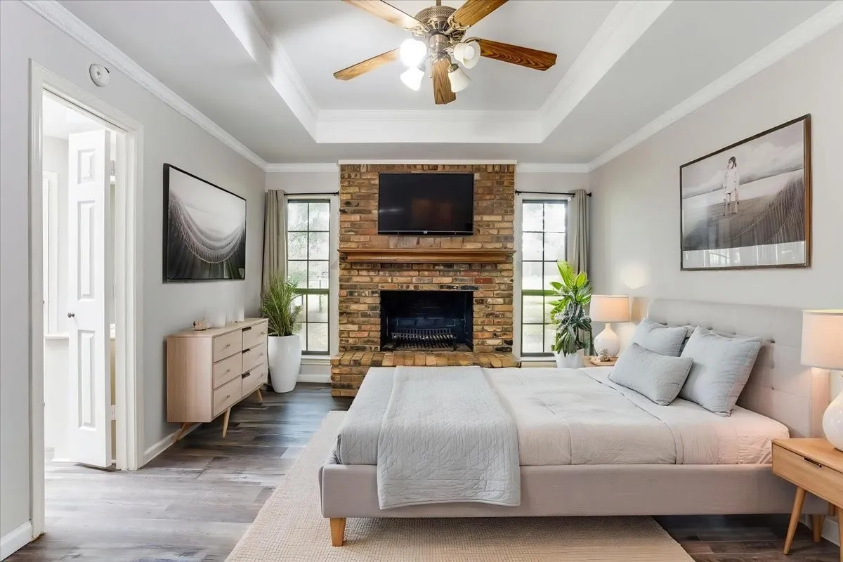 primary bedroom has a wood burning fireplace