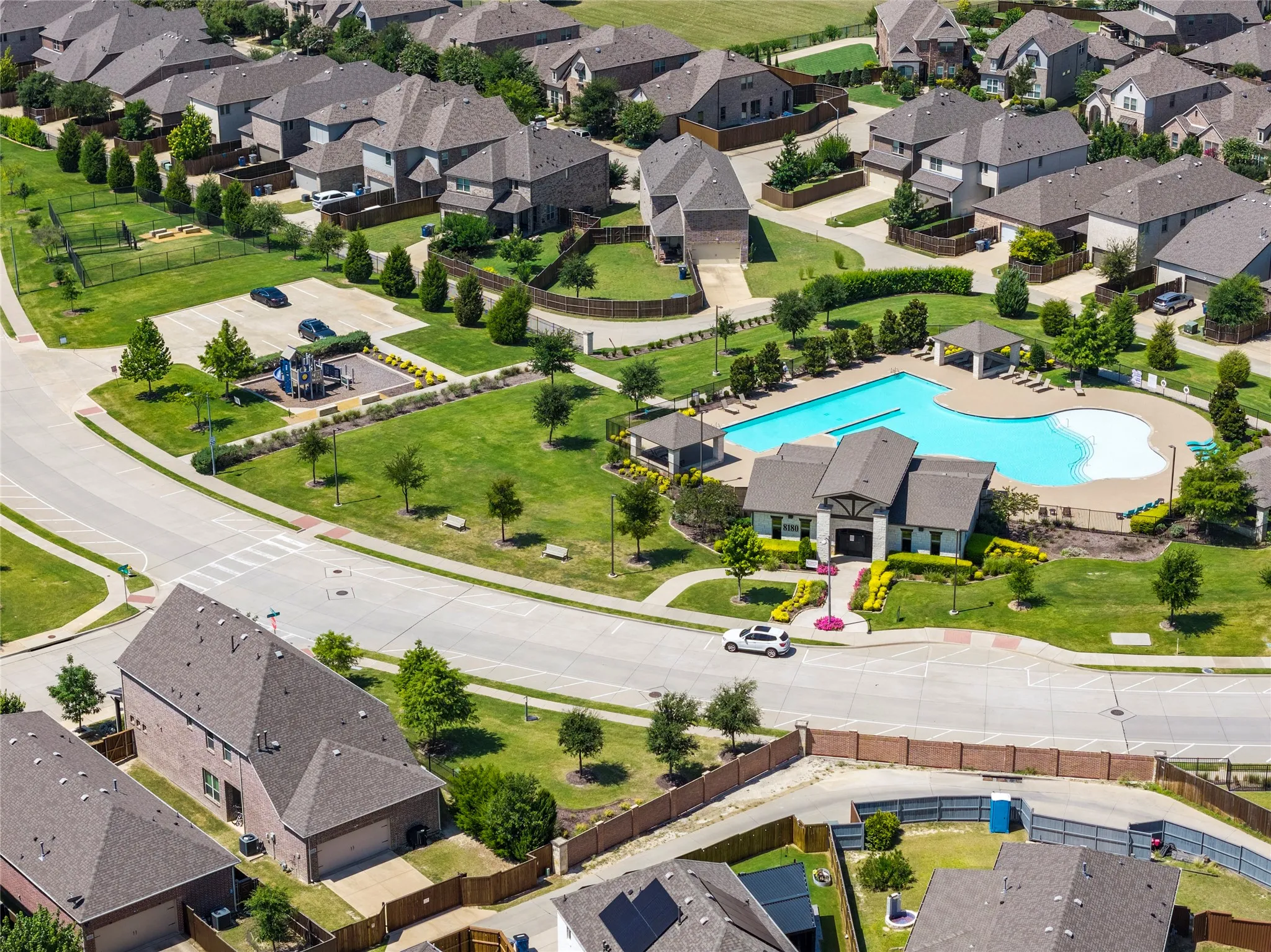 Community pool with surrounding lounge areas