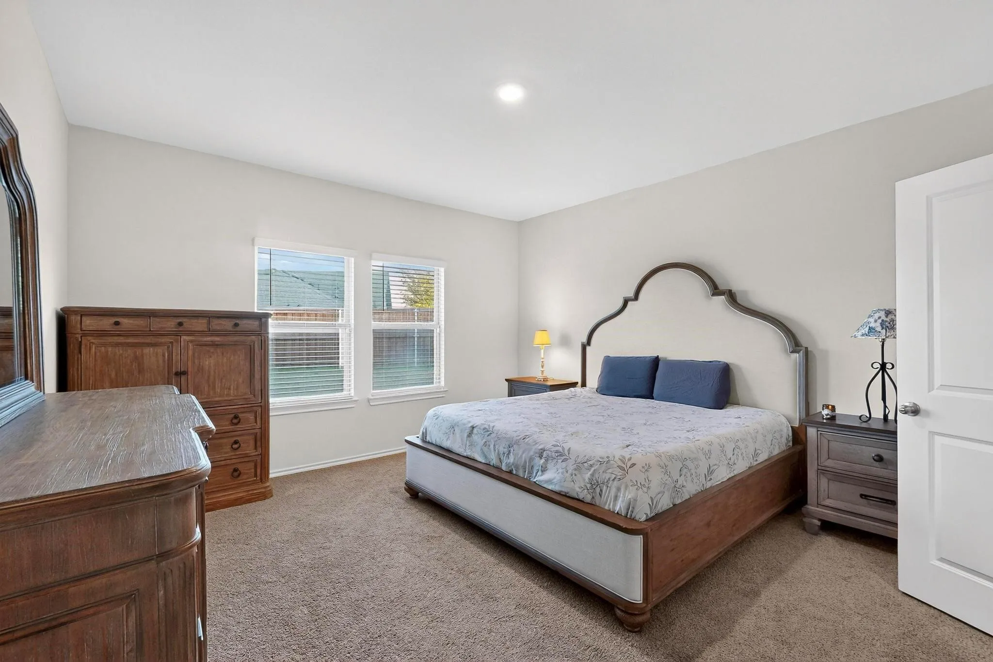 Bedroom featuring neutral wall paint and carpet flooring
