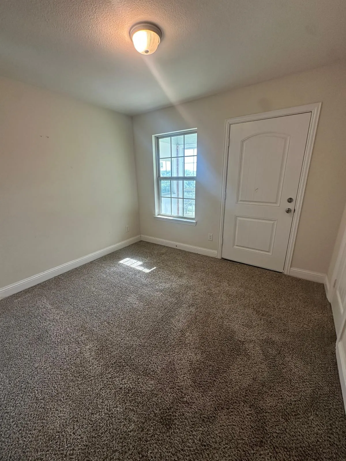 Secondary bedroom with exit to an enclosed balcony