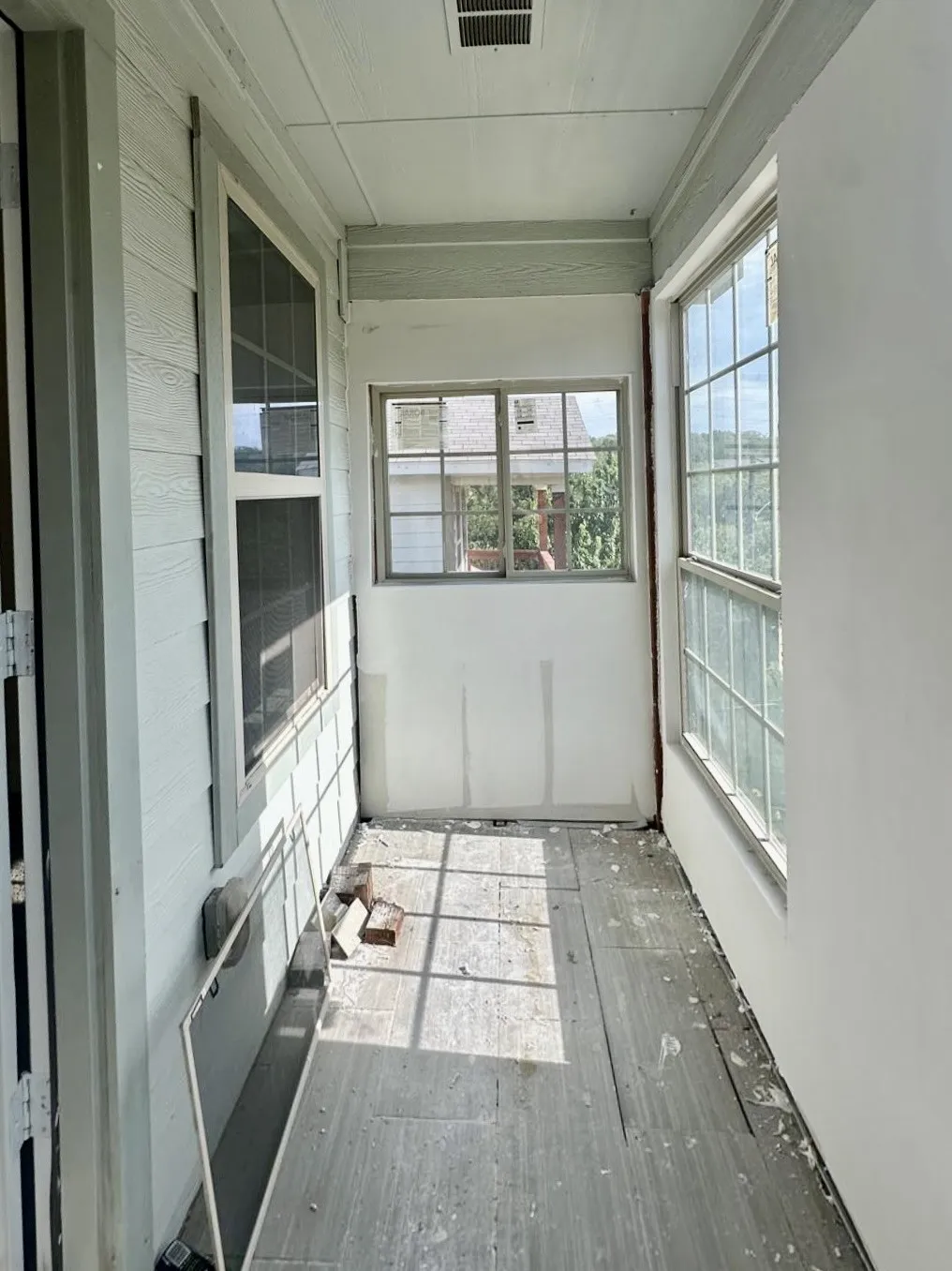 Enclosed balcony off a secondary bedroom