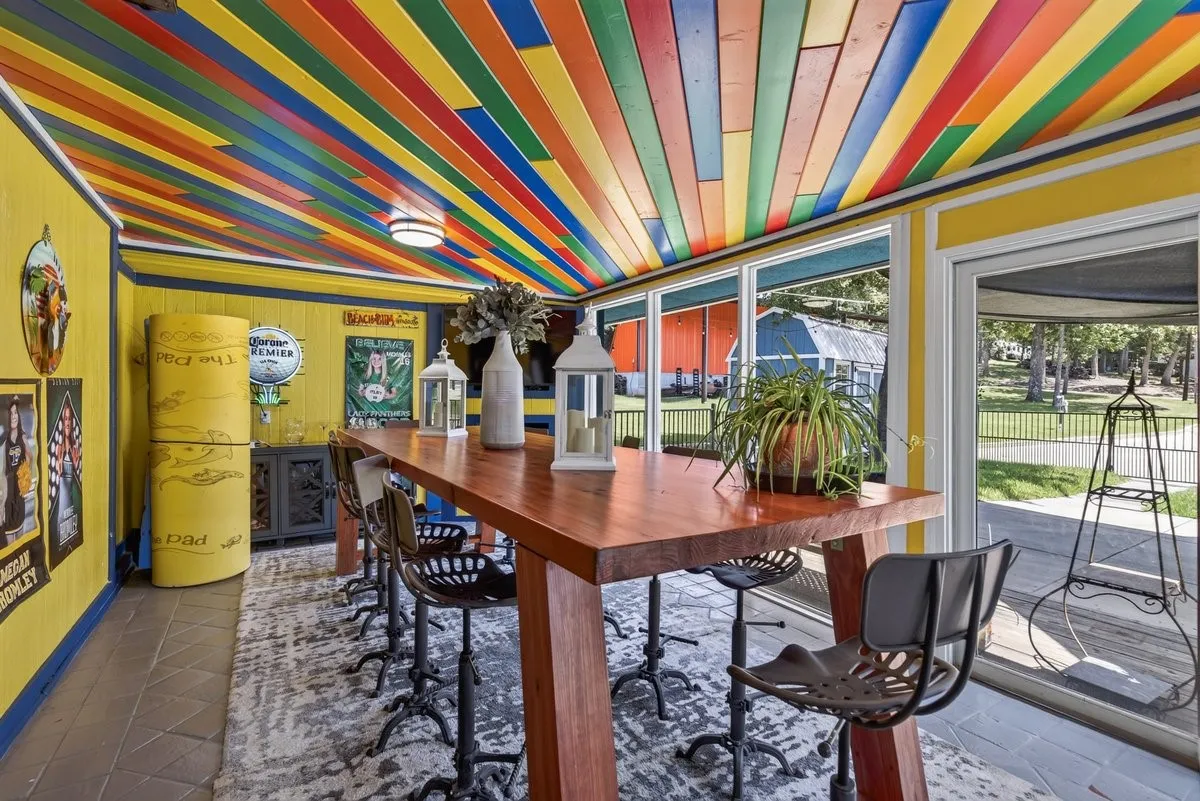 This fun sun room space is versatile but currently used as a  formal dining for gatherings.