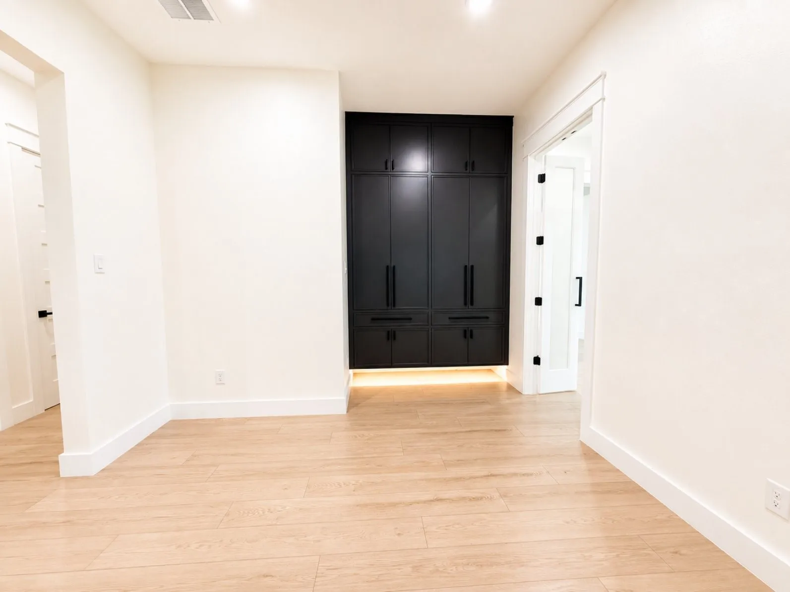 Dining area featuring recessed lighting, light wood-finish flooring, and a built-in cabinetry wall/built-in butler
