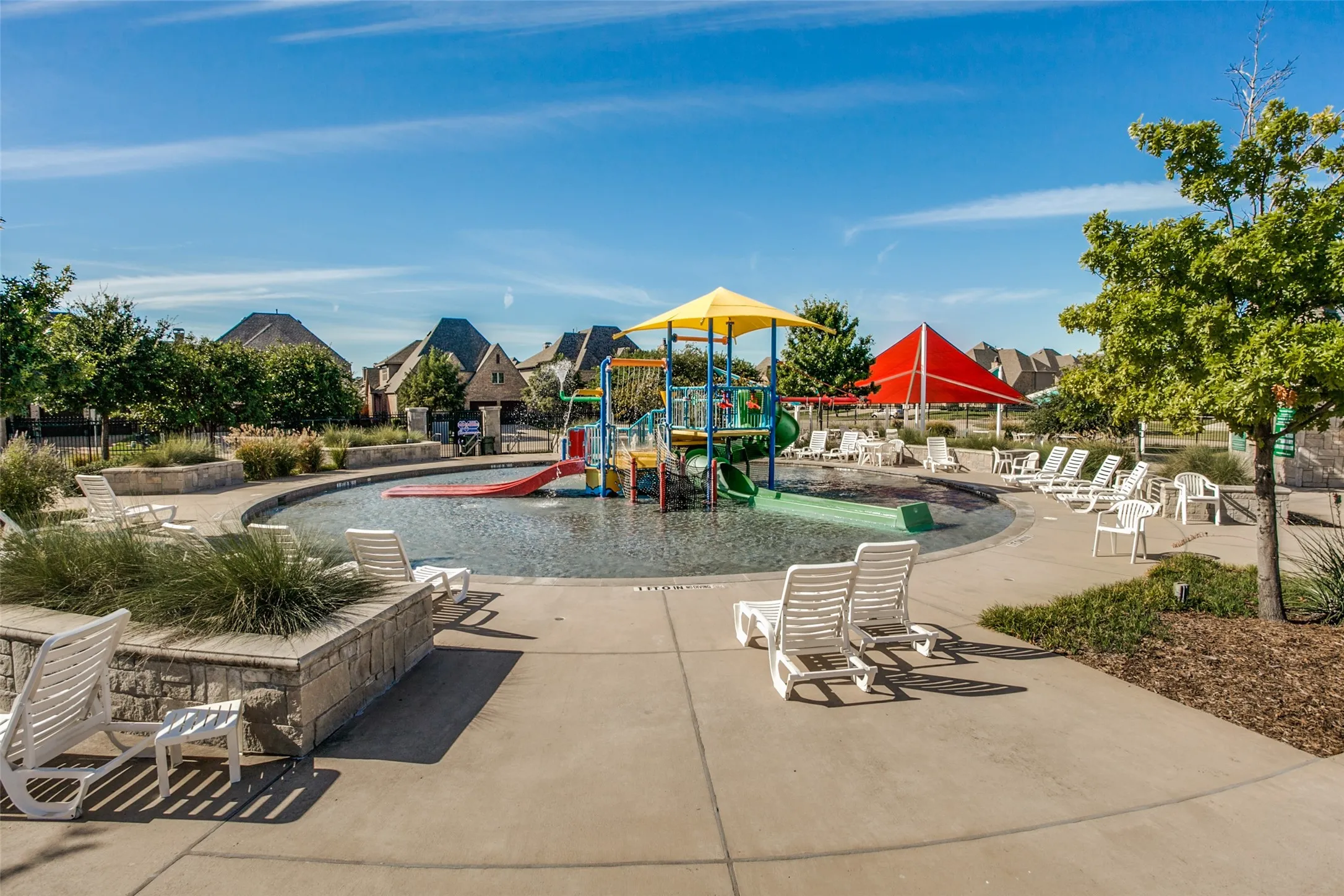 Younger residents have their own designated splash park.  Basically, a playground in the water, this fun area allows kids to splash in the shallow water, slide into the water and climb from spot to spot.  Spectators have sunny or shady areas to watch the fun.