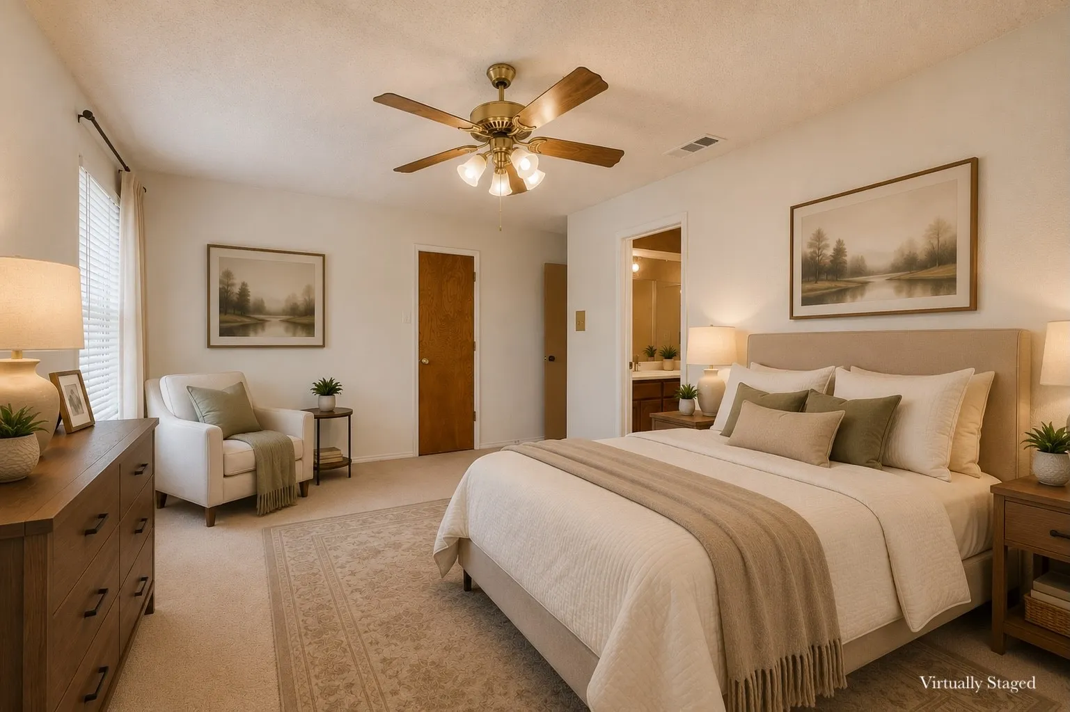 Spacious bedroom featuring light-colored carpeting, a ceiling fan with integrated lighting, and white walls